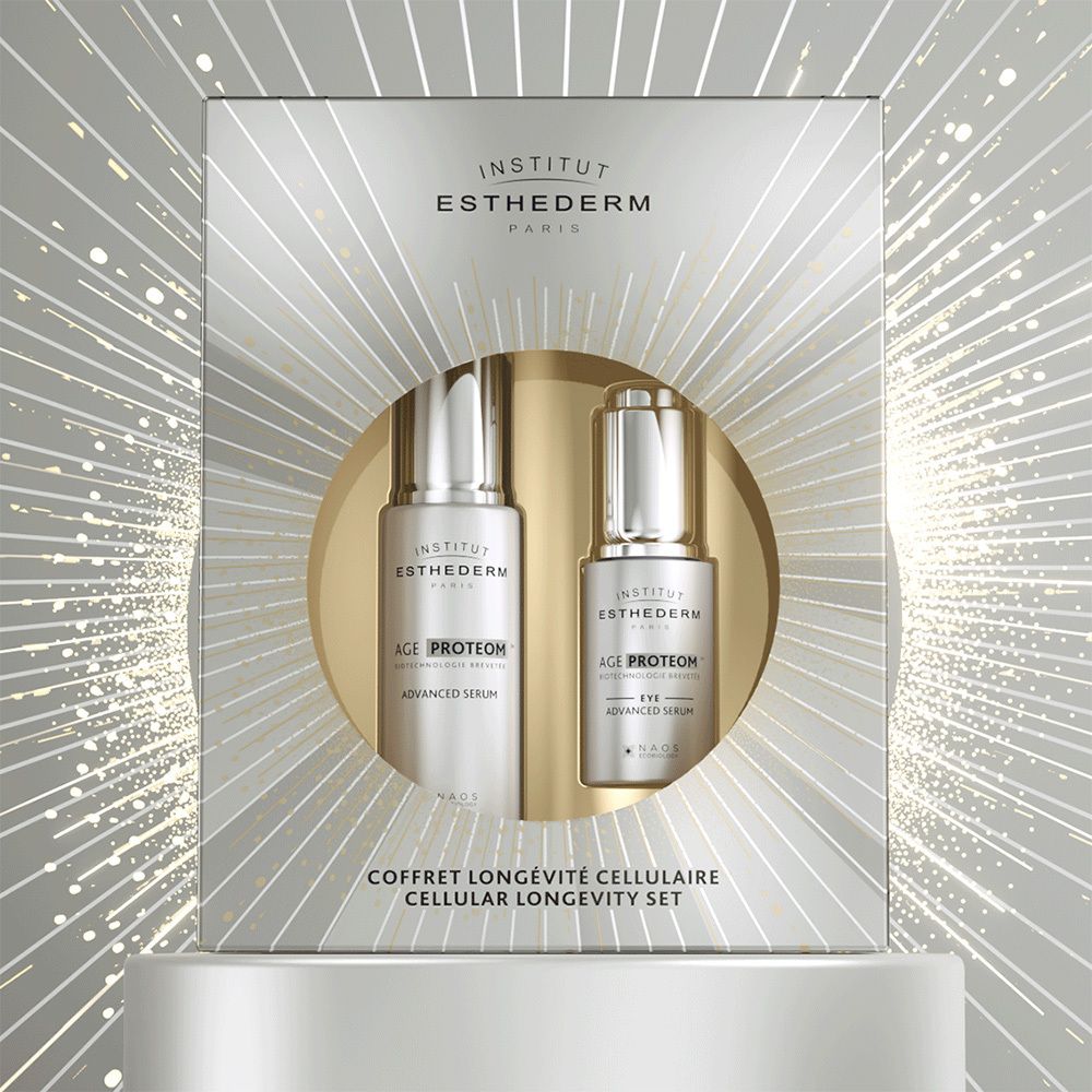 Coffret Longévité Cellulaire Institut Esthederm avec deux sérums en flacons argentés, présentés dans un coffret argenté.