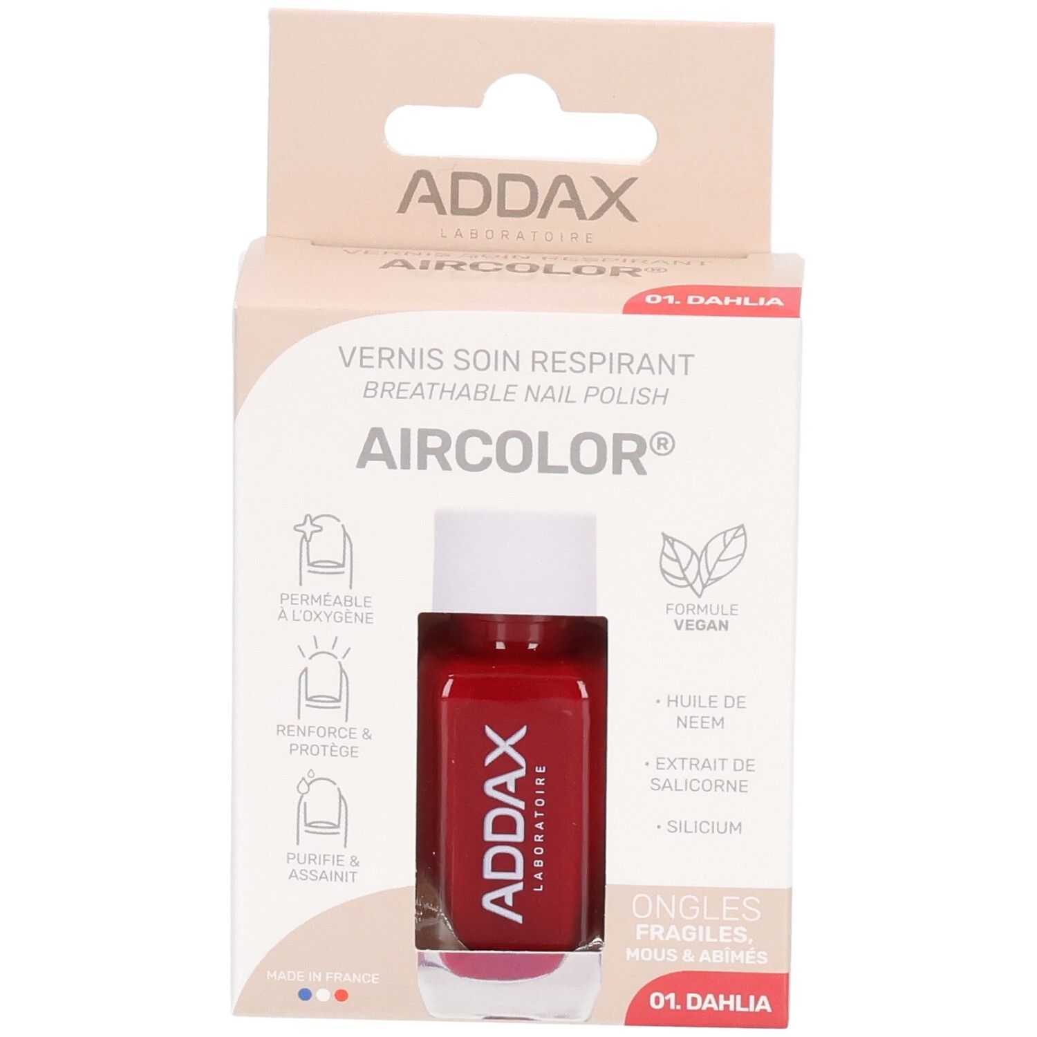 Flacon de vernis à ongles dans son emballage. Rouge, marque ADDAX. Informations produit sur l'emballage.
