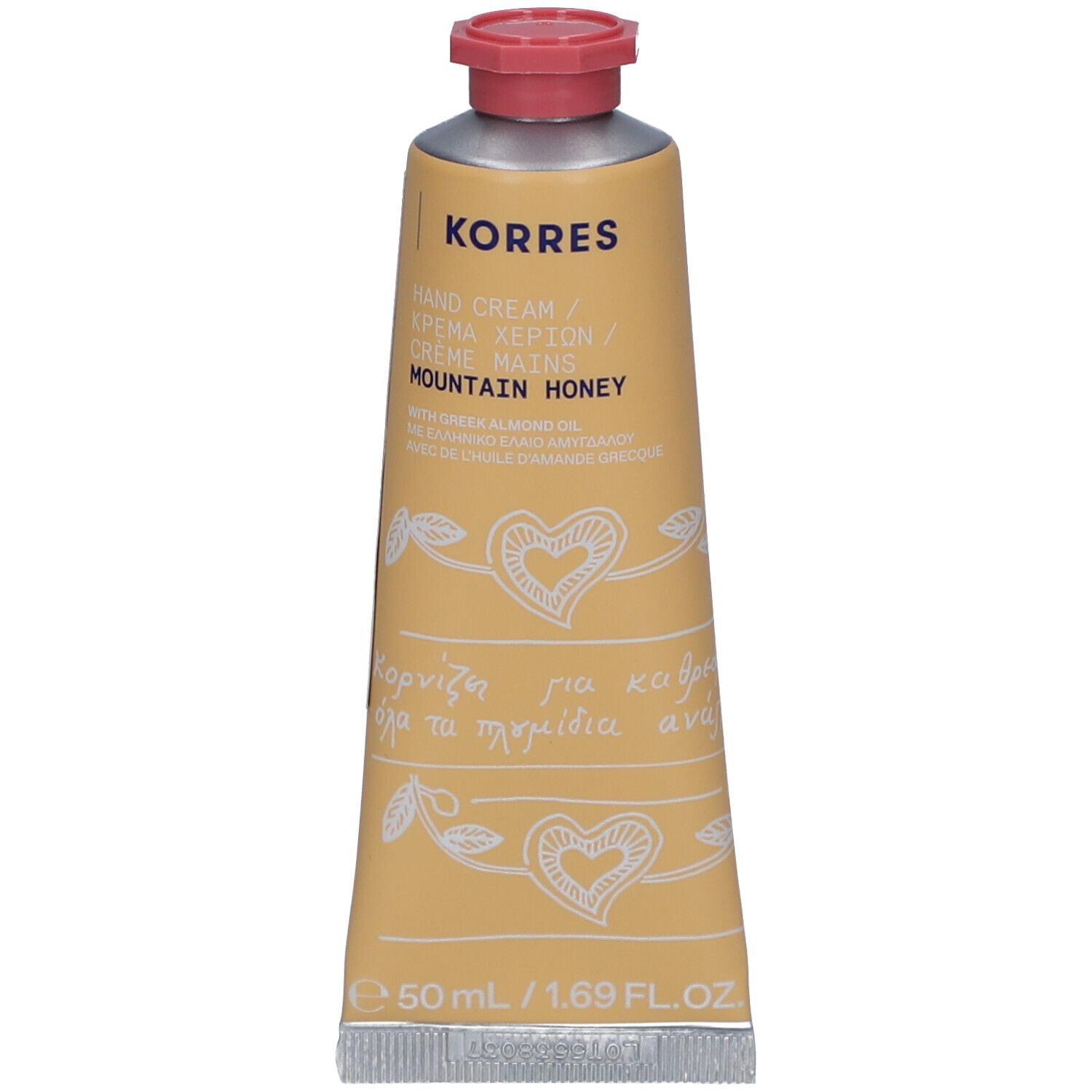 Tube beige à bouchon rouge. Inscription : KORRES, Hand Cream, Mountain Honey. Décoré de cœurs et de feuilles. 50 ml.