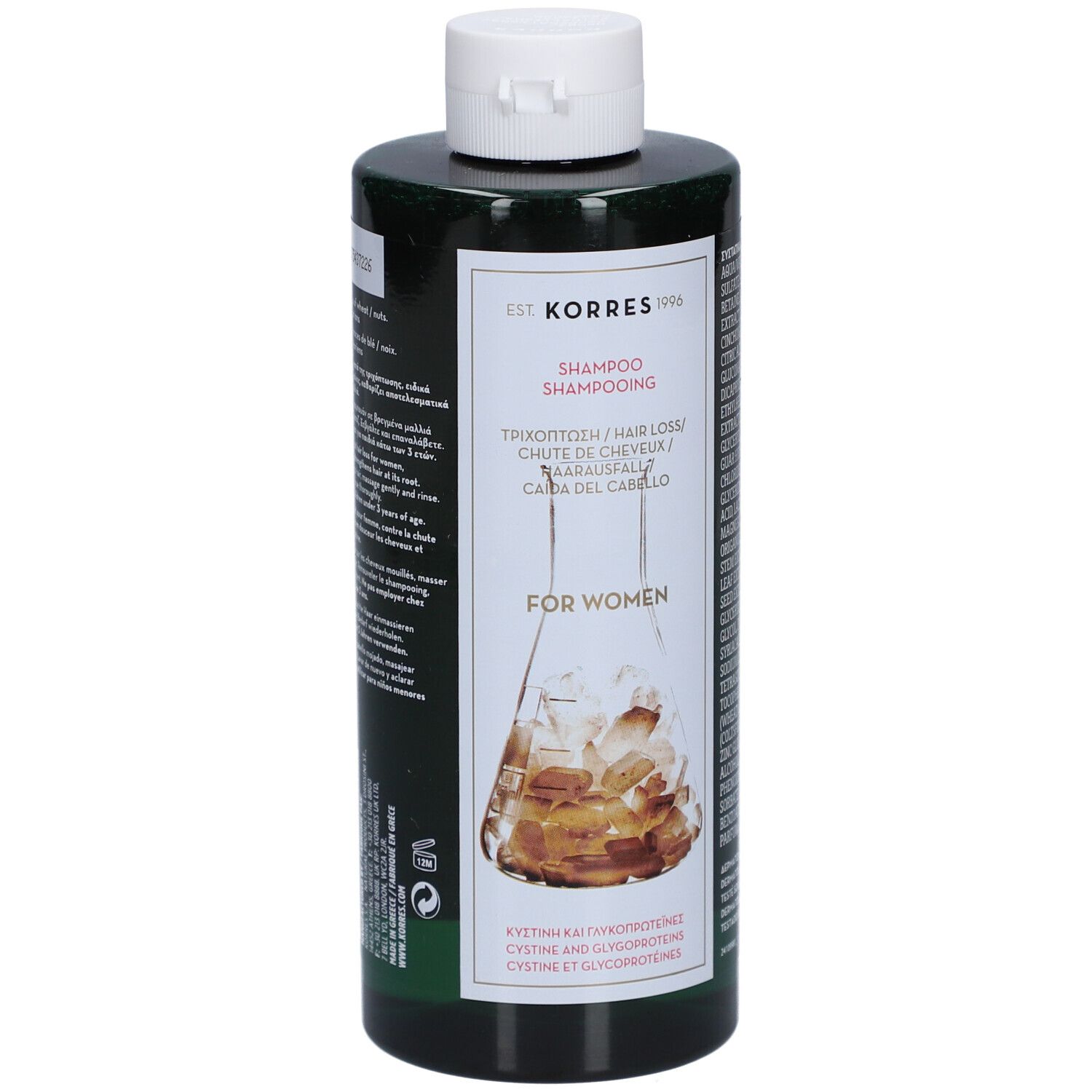 Flacon vert avec bouchon blanc. Étiquette avec nom du produit et marque Korres. Shampooing anti-chute de cheveux pour femmes.