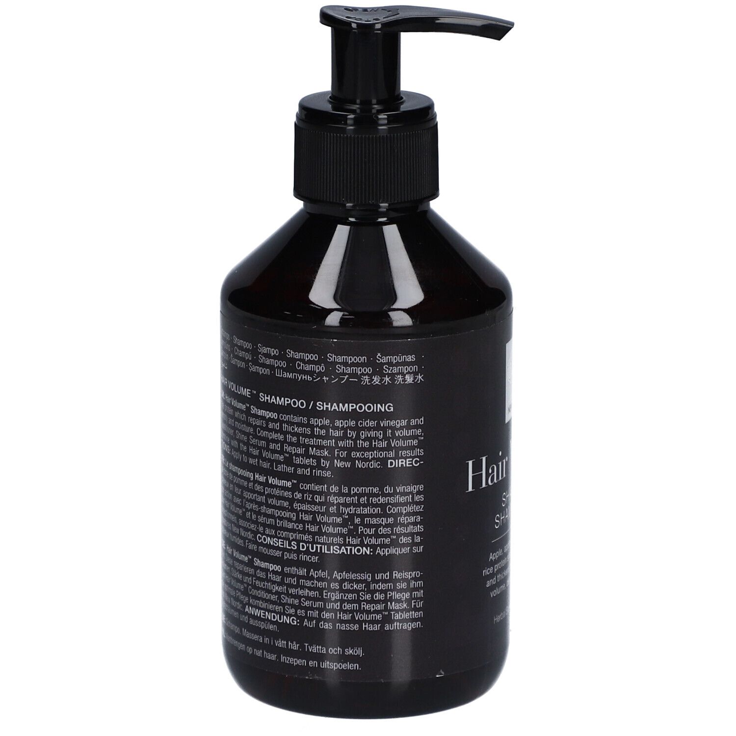 Flacon noir avec pompe noire. Texte : Hair Volume Shampooing. Informations produit multilingues.