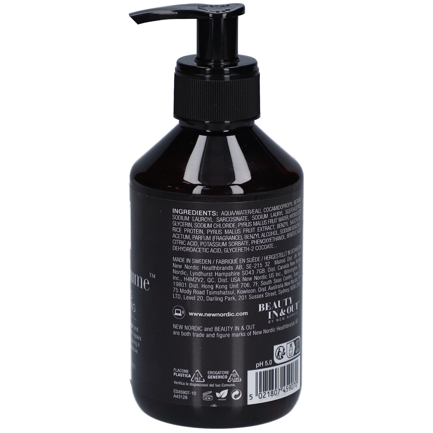 Flacon noir avec pompe noire. Inscription : Hair Volume Shampooing. Ingrédients et informations fabricant.