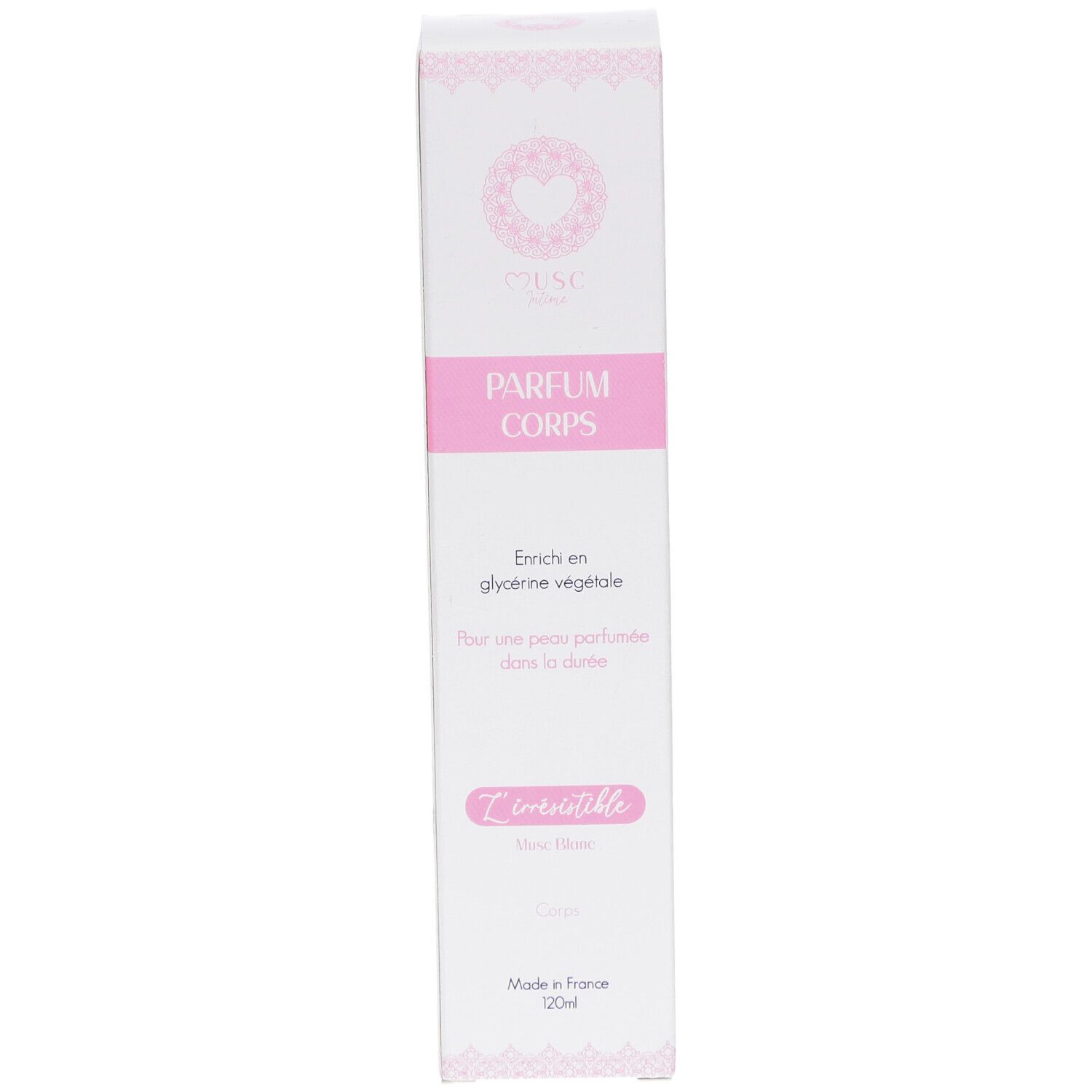 Boîte blanche allongée avec accents roses. Texte: PARFUM CORPS, L'irrésistible, Musc Blanc. Fabriqué en France. 20ml.