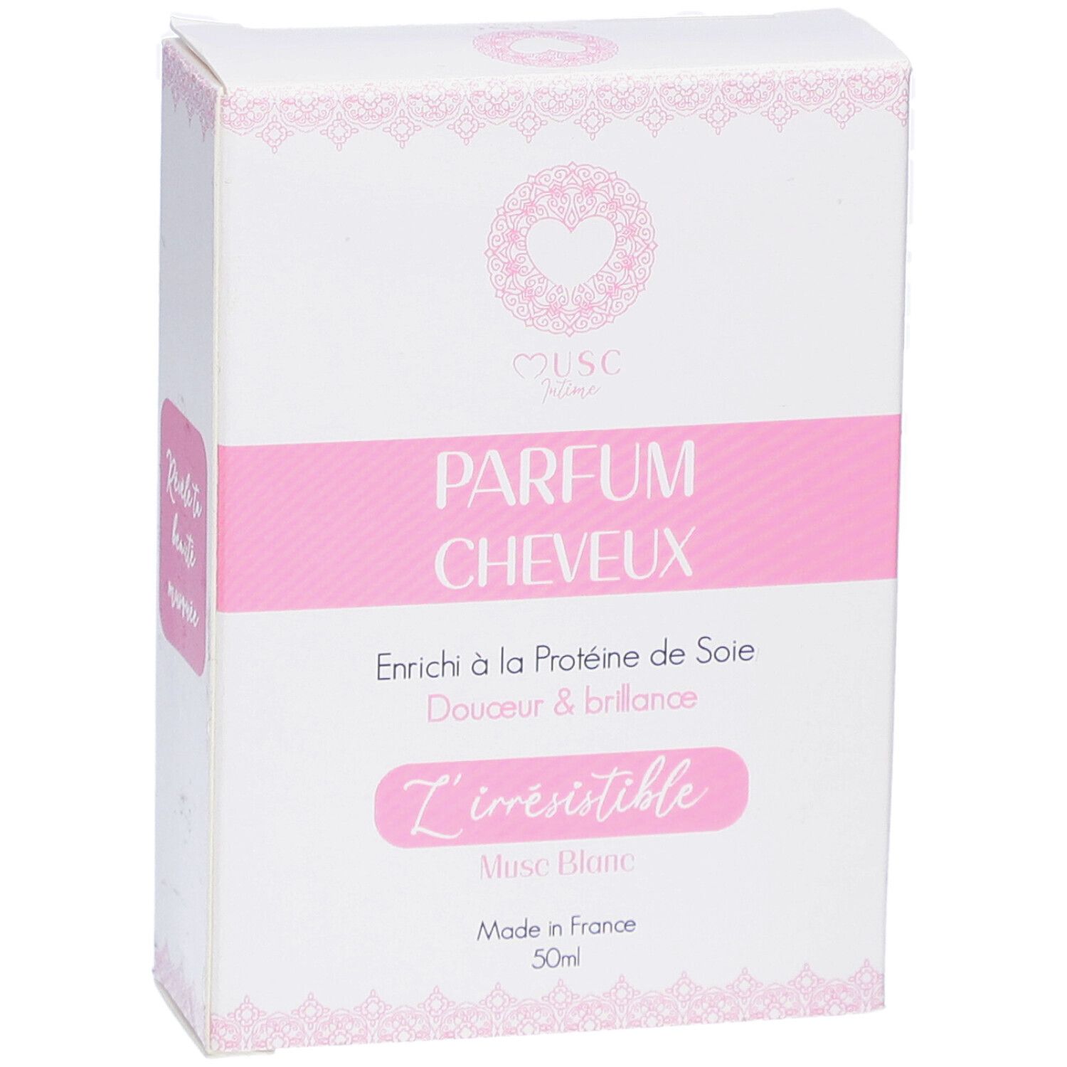 Boîte blanche avec accents roses. Texte: PARFUM CHEVEUX, L'irrésistible, Musc Blanc, Made in France, 50ml.