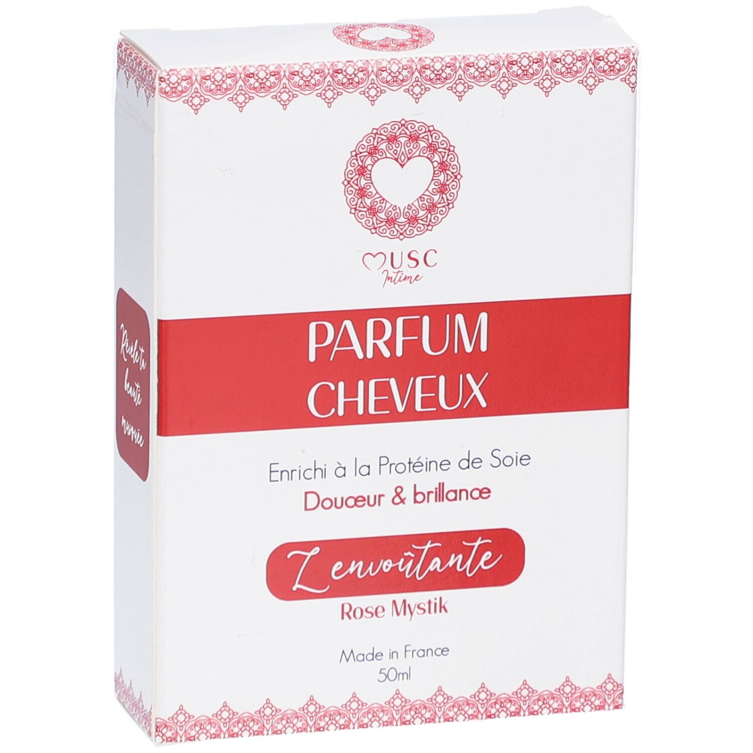 Boîte blanche avec bande rouge. Inscription: PARFUM CHEVEUX. Contient des protéines de soie. Rose Mystik. Fabriqué en France. 50ml.