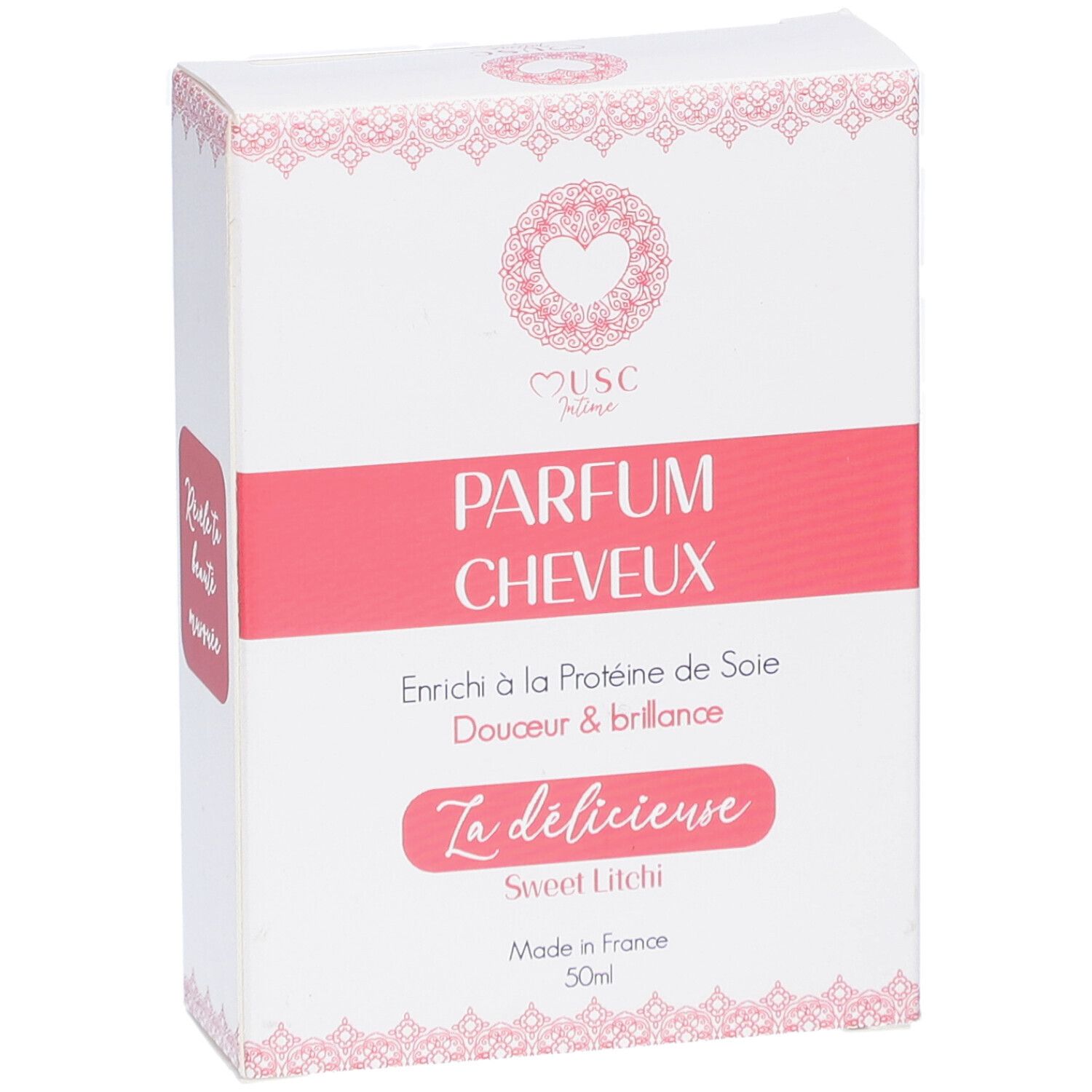 Boîte blanche et rose. Texte: "Musc Intime Parfum Cheveux". "La délicieuse Sweet Litchi". Fabriqué en France. 50ml.
