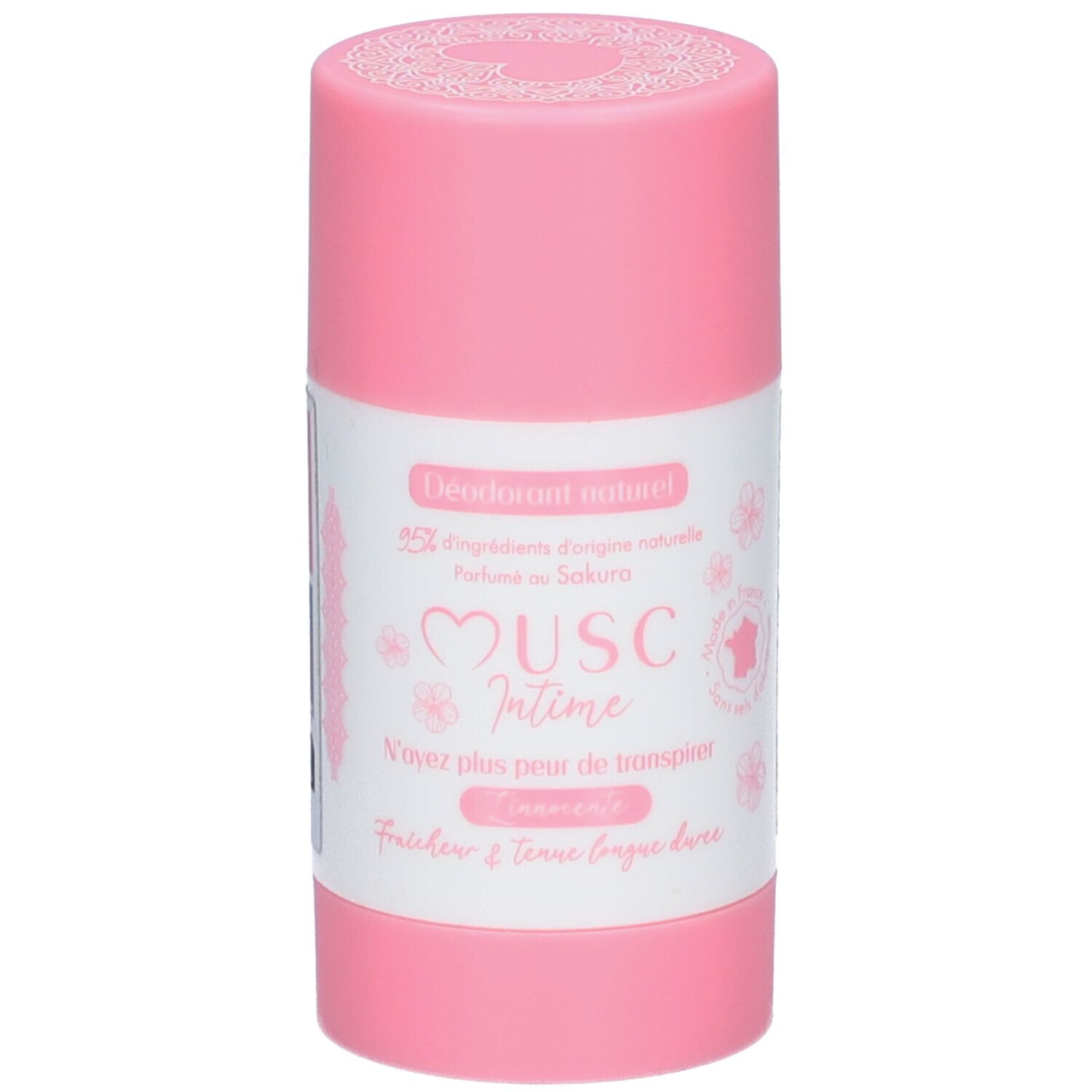 Stick de déodorant rose. Étiquette blanche avec texte: "Musc Intime", "Fleur de Sakura".