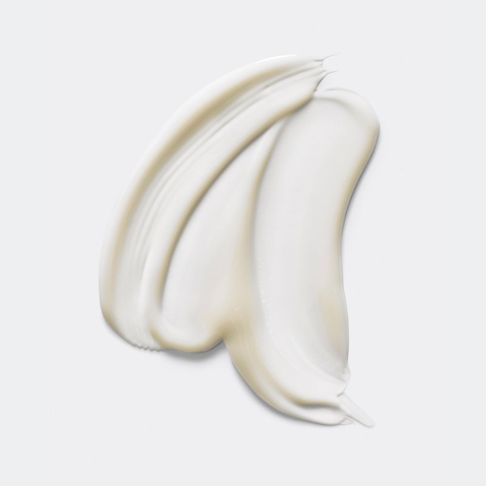 Sérum blanc, texture crémeuse. Sur fond clair. Nom de la marque ou du produit non visible.
