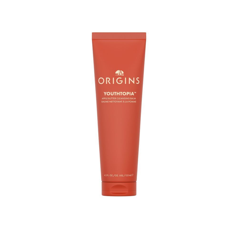 Tube rouge avec texte blanc: Origins Youthtopia Apple Butter Cleansing Balm. Logo en haut.