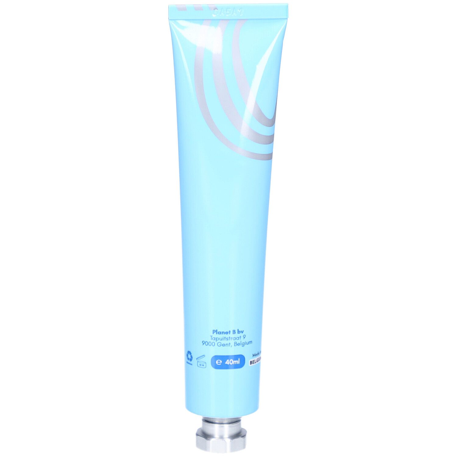 Tube bleu clair avec bouchon argenté. Informations et logo au dos.