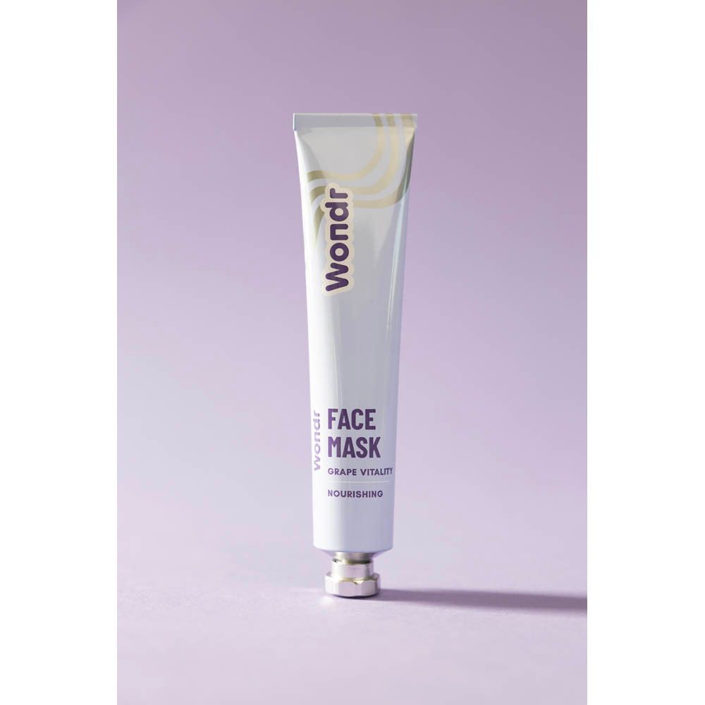 Tube blanc avec texte violet Wondr, Face Mask, Grape Vitality et Nourishing. Bouchon métal.