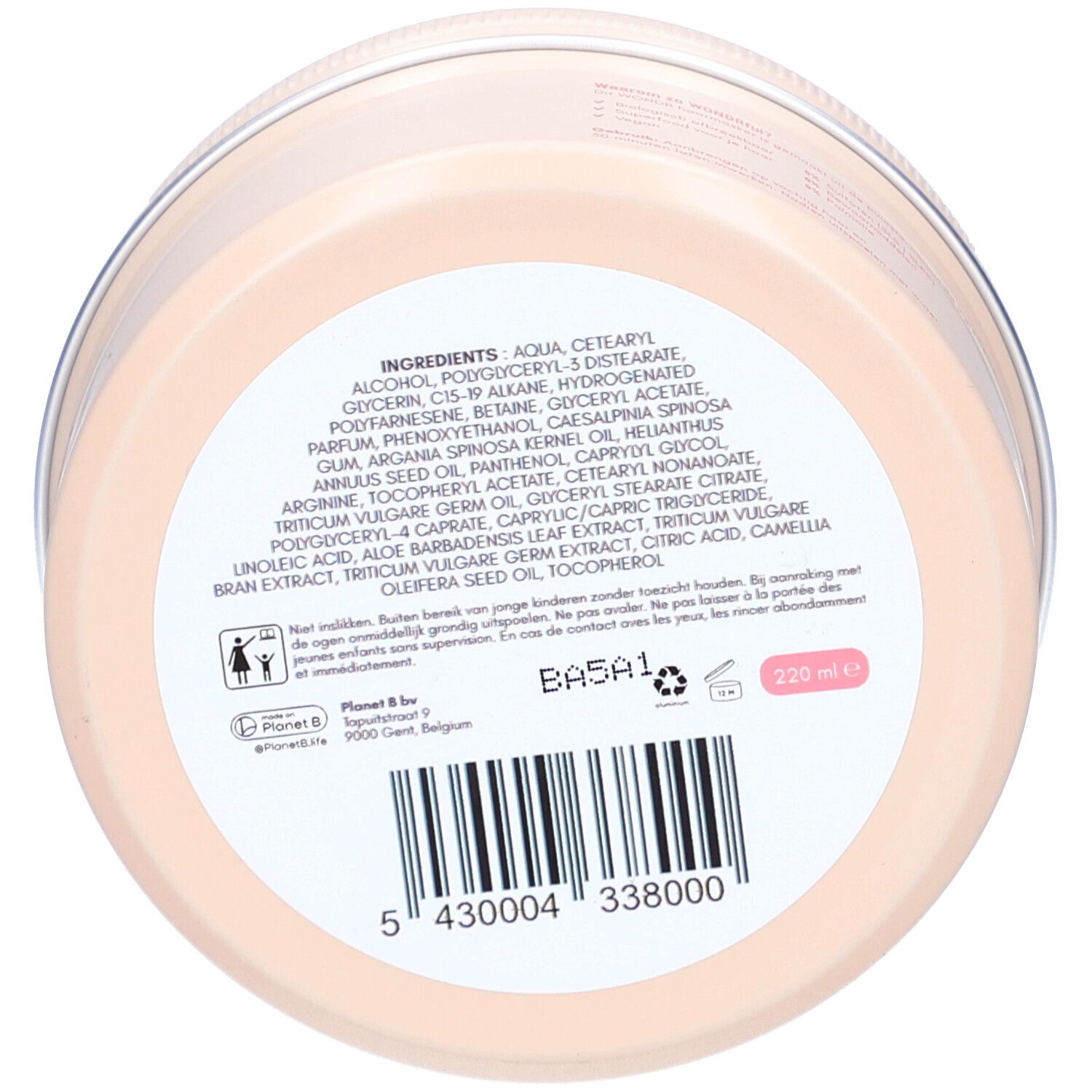 Fond d'un récipient rond. Inscription avec ingrédients, code-barres et avertissements. Contenance : 220 ml.