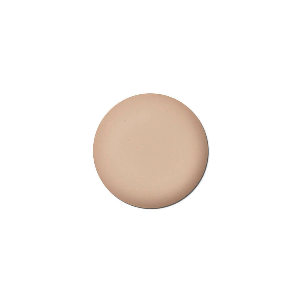Cercle de crème teintée. Brun clair, sur fond blanc.