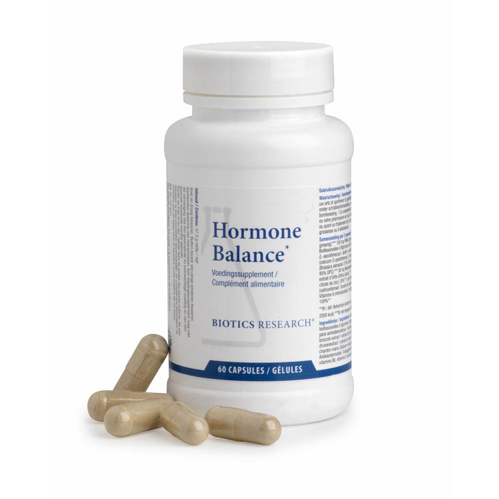 Flacon blanc avec 'Hormone Balance' et 'Biotics Research'. 60 gélules. Quelques gélules à côté.