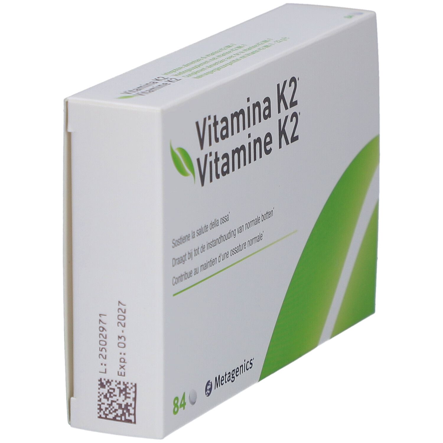 Boîte blanche avec "Vitamina K2". Contient 84 comprimés. Marque: Metagenics. Logo feuille verte. Date d'expiration.