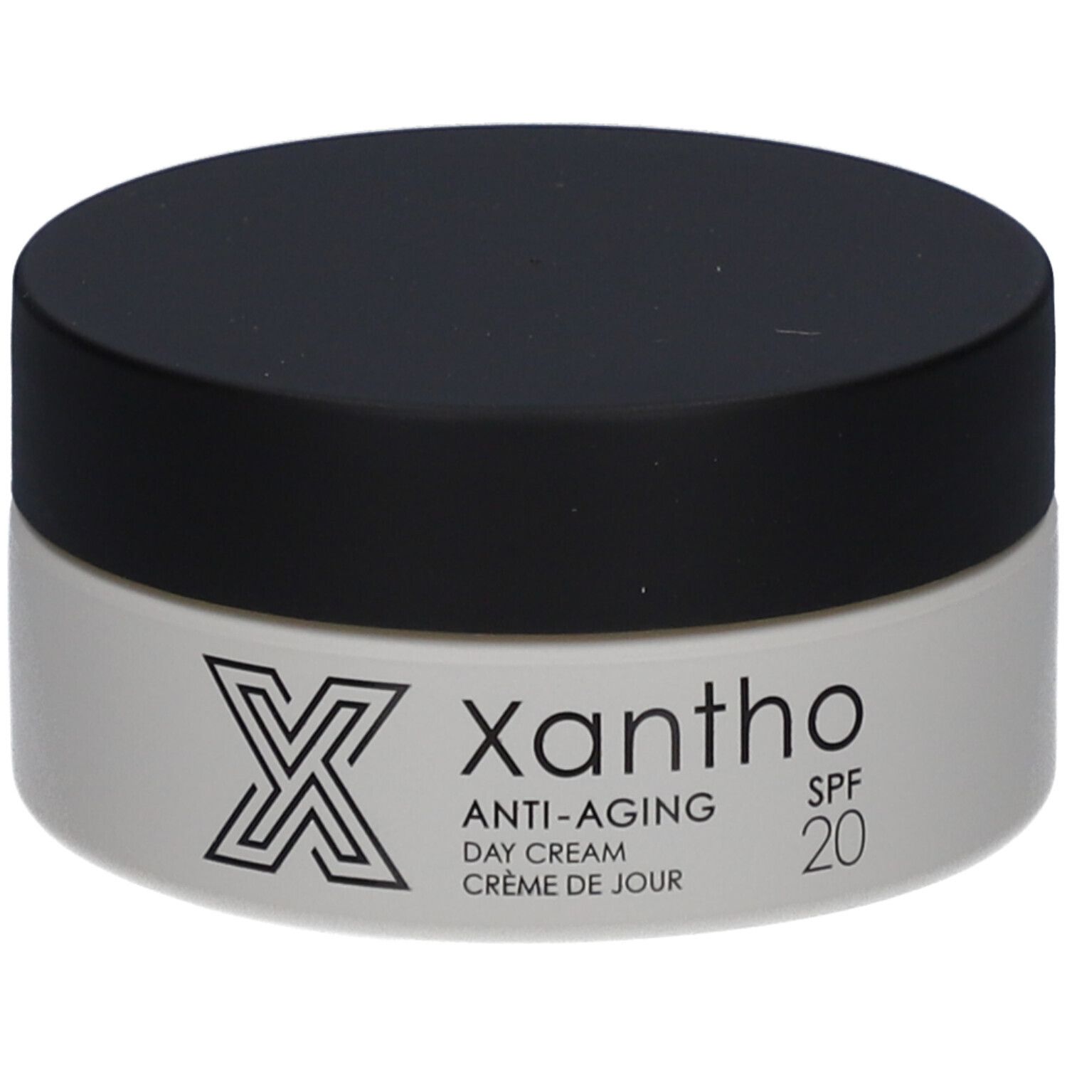 Pot de crème avec couvercle noir. Inscription : Xantho, Anti-Aging, Day Cream, Crème de jour, SPF 20.