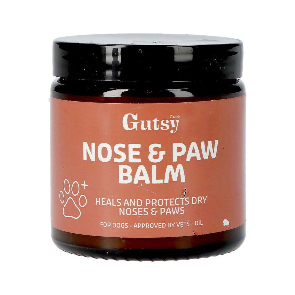 Pot marron avec couvercle noir. Inscription: Gutsy Nose & Paw Balm. Symbole de patte. Pour chiens.