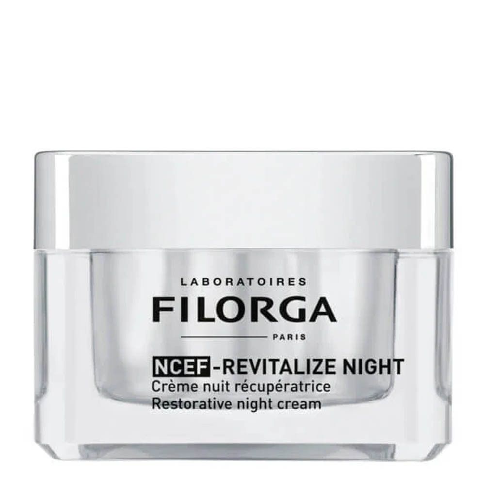 Pot transparent avec couvercle argenté. Inscription : LABORATOIRES FILORGA PARIS, NCEF-REVITALIZE NIGHT, Crème nuit récupératrice, Restorative night cream.