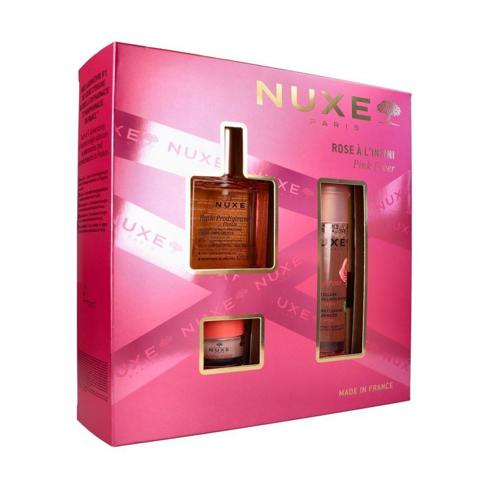 Côté d'une boîte cadeau Nuxe rose avec informations produit.