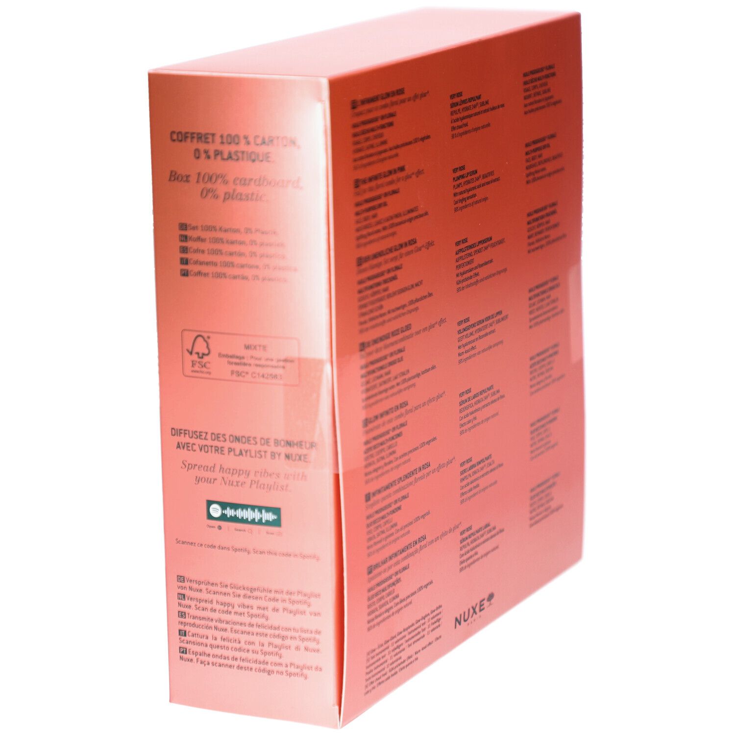 Coffret cadeau rose avec texte. Texte: Coffret 100% carton, 0% plastique. Logo FSC. Texte: Nuxe Paris, code Spotify.