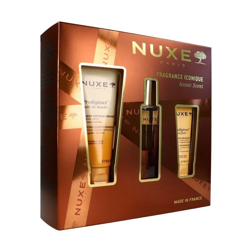 Coffret Nuxe contenant trois produits pour le corps : huile de douche, huile corps et crème mains.