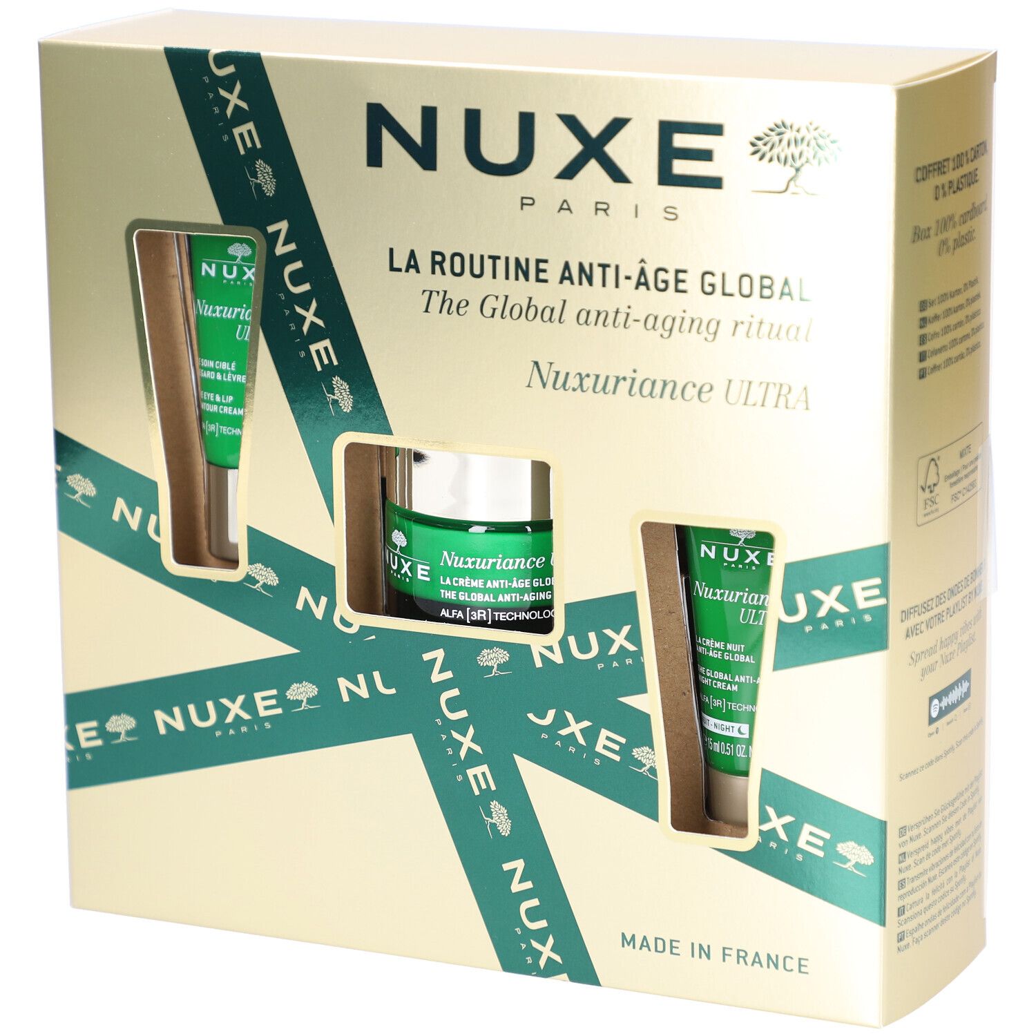 Coffret cadeau Nuxe avec trois produits. Contient des crèmes et des tubes. Emballage avec des accents verts et le nom du produit.