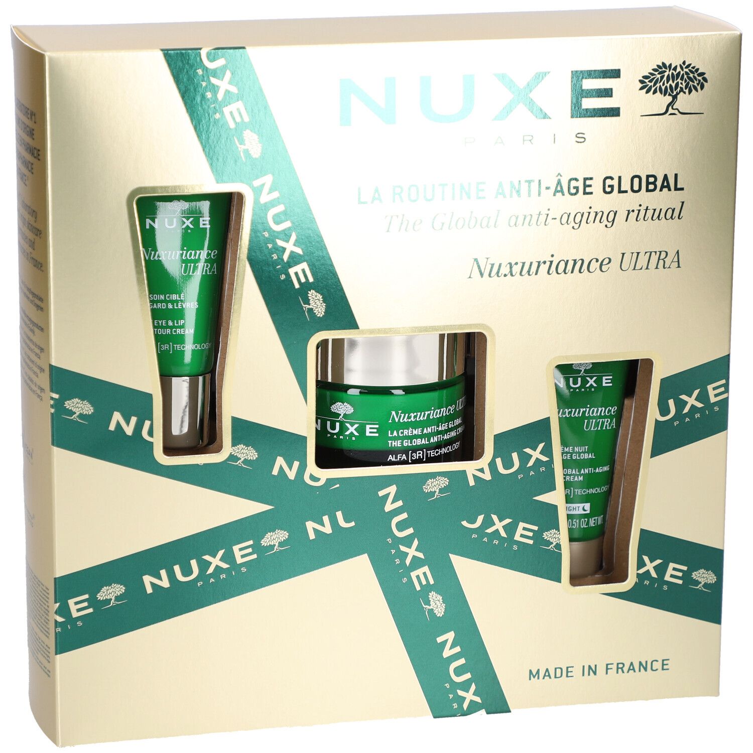 Coffret cadeau Nuxe avec trois produits. Contient des crèmes et des tubes. Emballage avec des accents verts et le nom du produit.