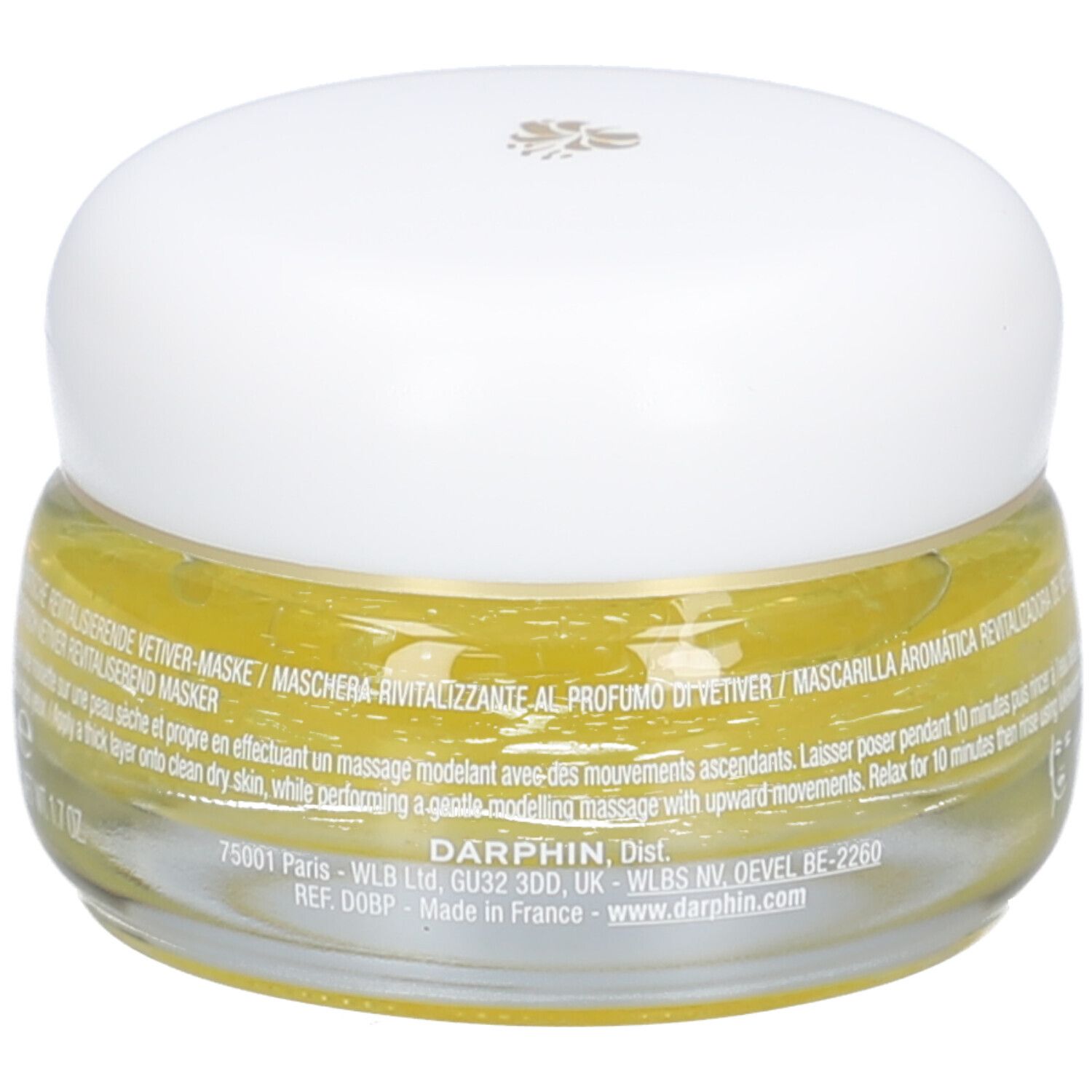 Pot en verre avec crème jaune et couvercle blanc. Texte: Maschera Rivitalizzante al Profumo di Vetiver. Logo Darphin.