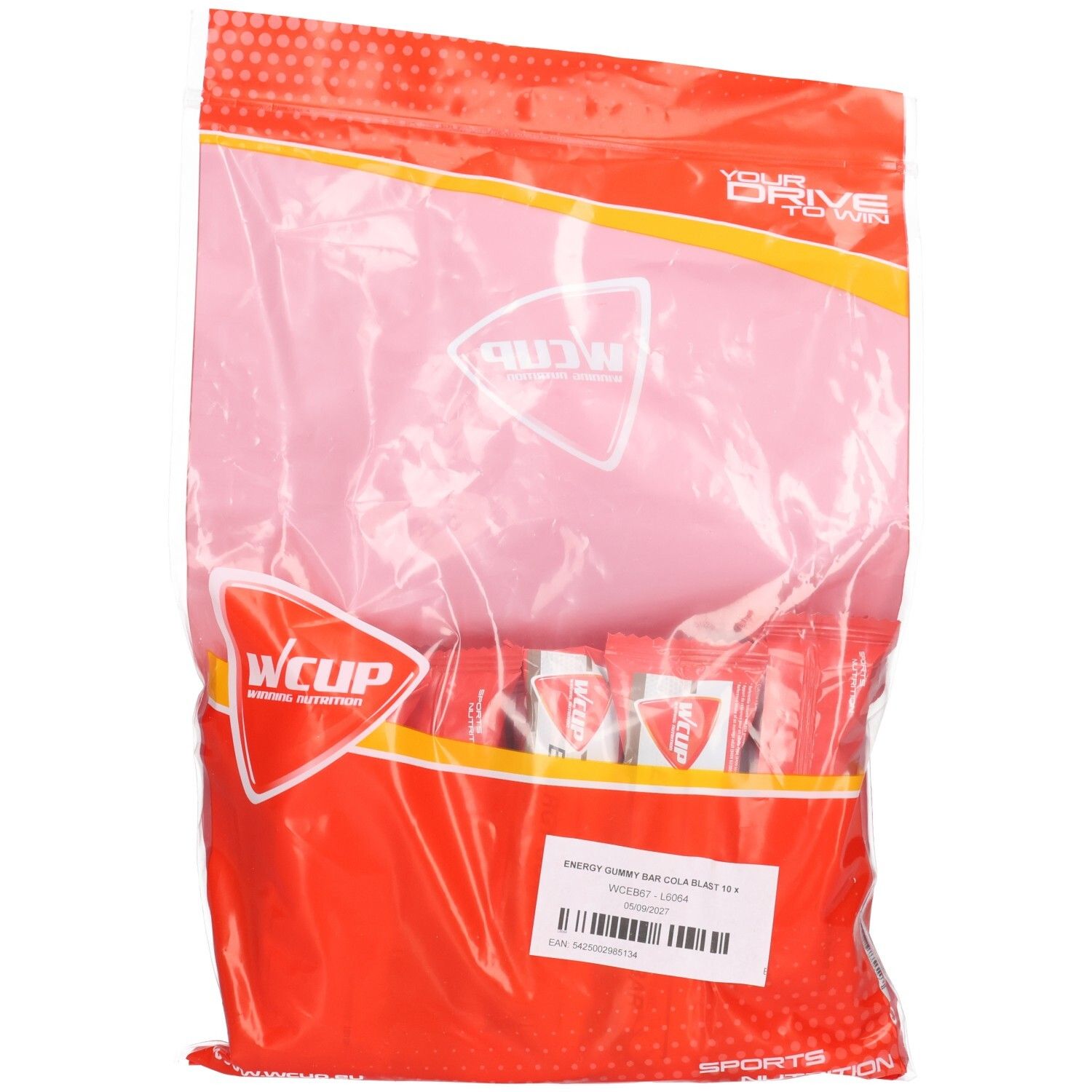 Emballage de barres de gomme énergétiques Wcup Cola Blast. Sac en plastique rouge et rose contenant des sachets individuels. Logo visible.
