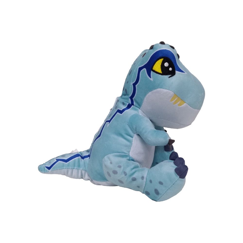 Dinosaure en peluche bleu, assis de côté. Oeil jaune, détails bleus. Fond blanc.