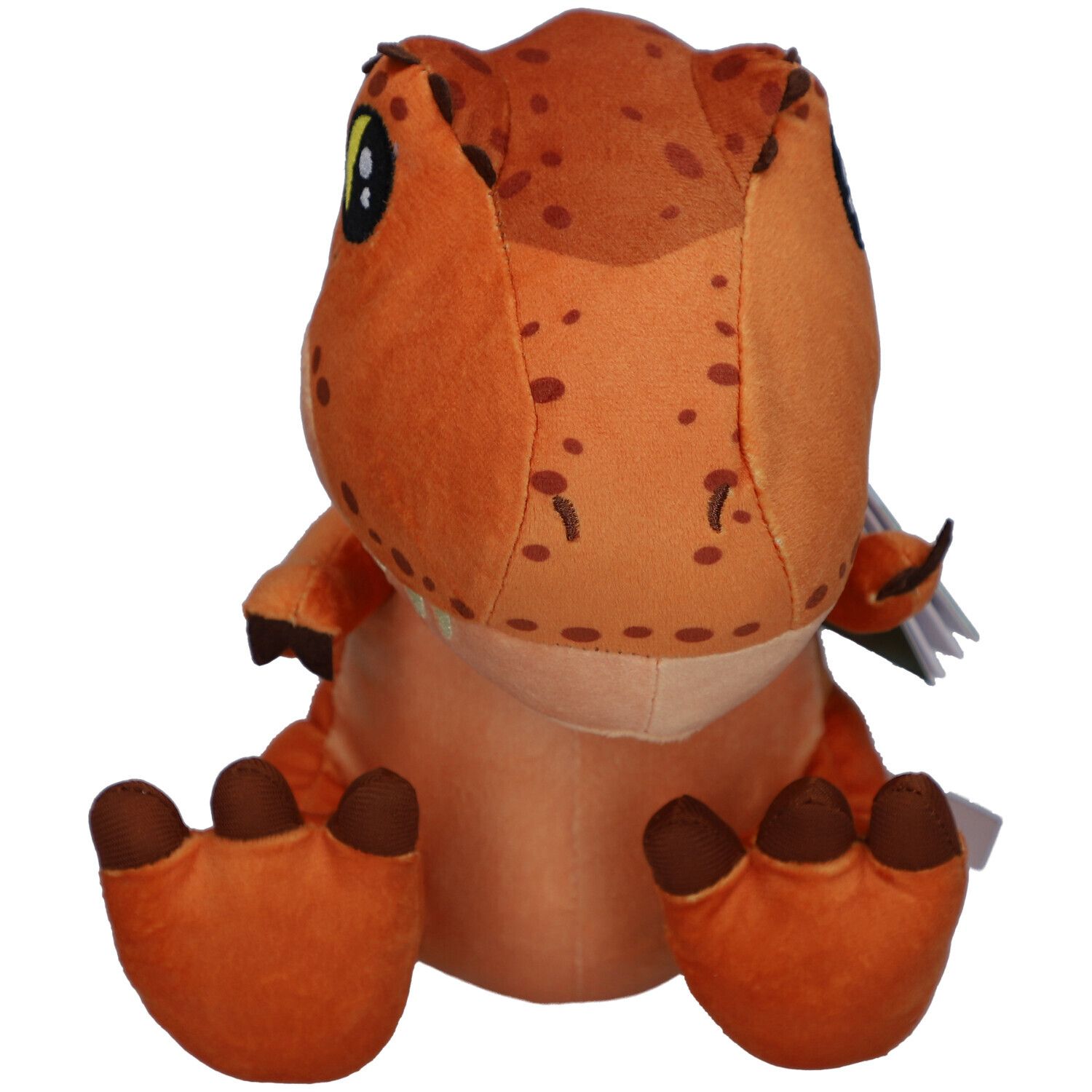 Vue arrière d'une peluche T-Rex orange. Une étiquette est attachée au produit.