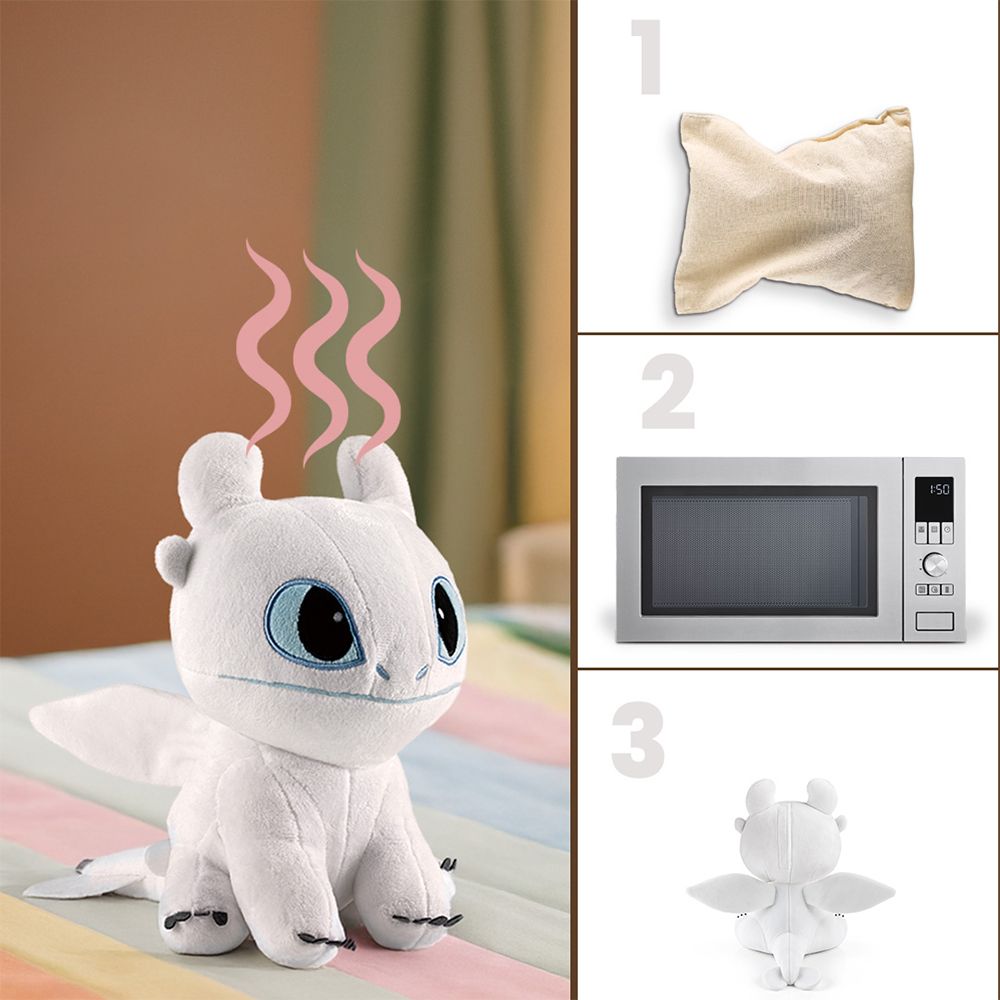 Dragon en peluche blanc chauffé au micro-ondes, avec instructions.
