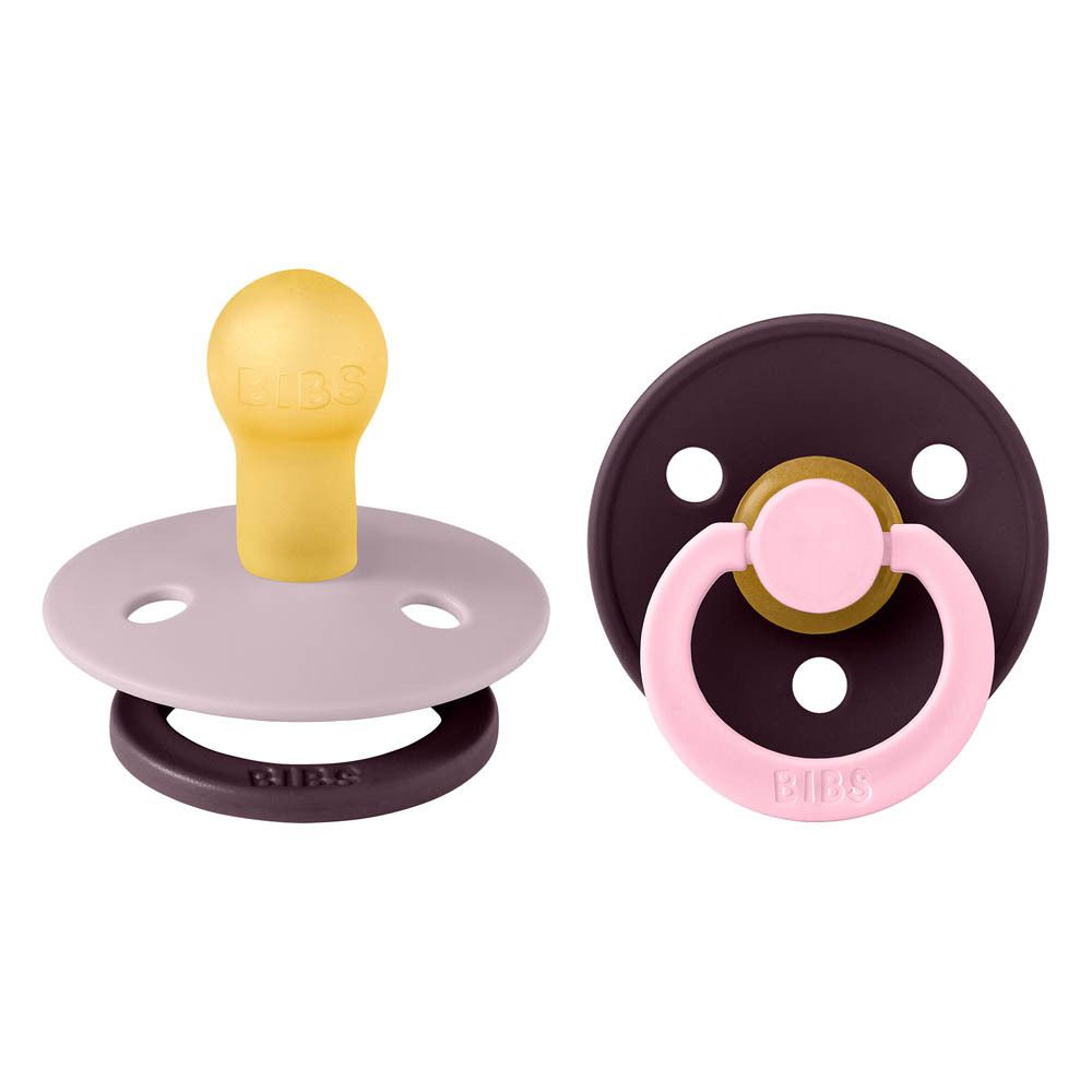 Deux sucettes. Logo BIBS sur la sucette. Lilas/Prune, forme ronde, taille 1. Tétine jaune.