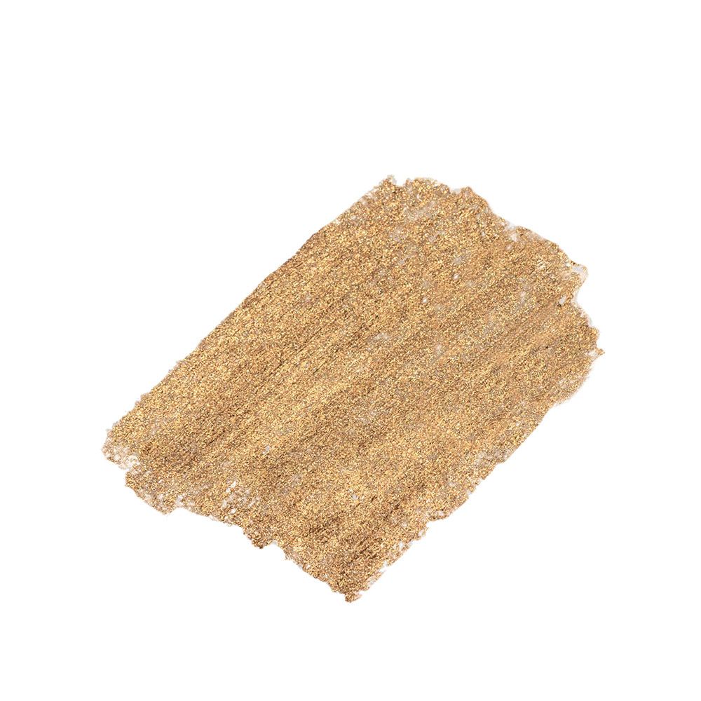 Échantillon de fard à paupières doré. Texture.