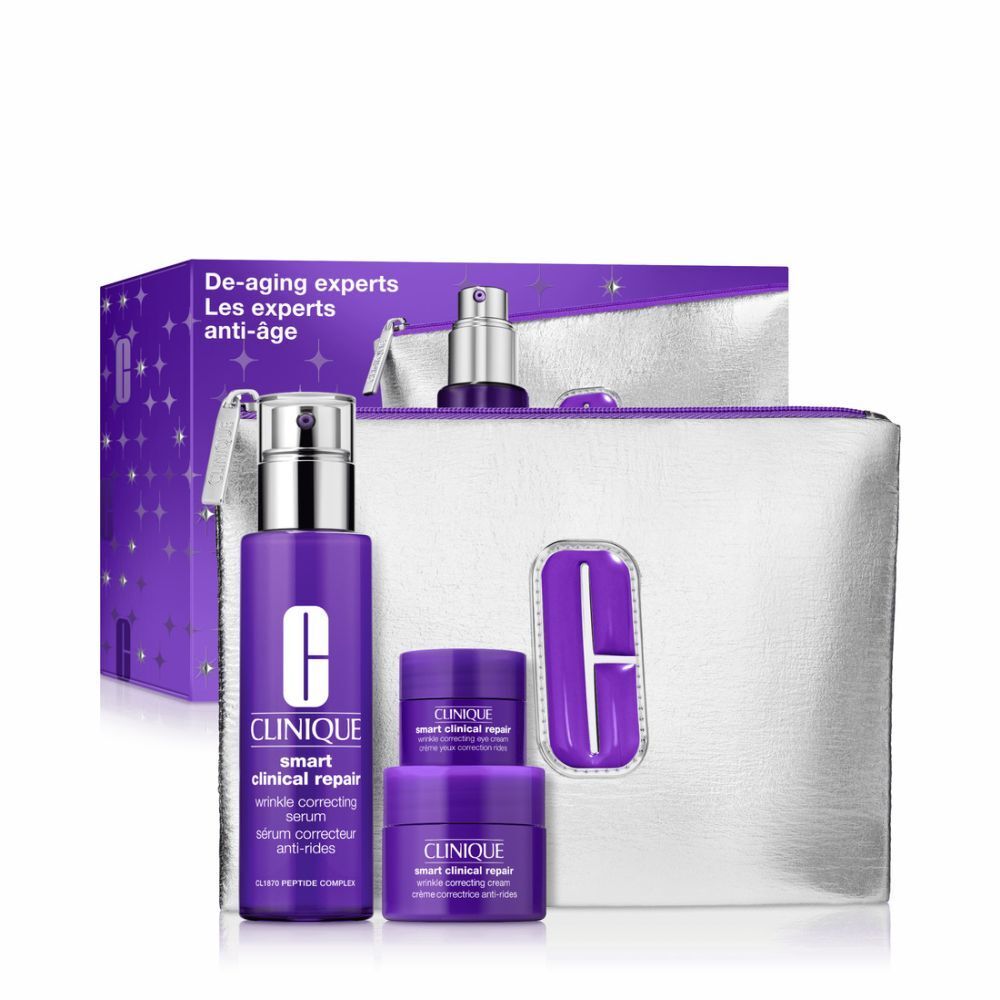 Coffret cosmétique avec flacons violets, pots et trousse argentée. Texte: Clinique, Smart Clinical Repair.