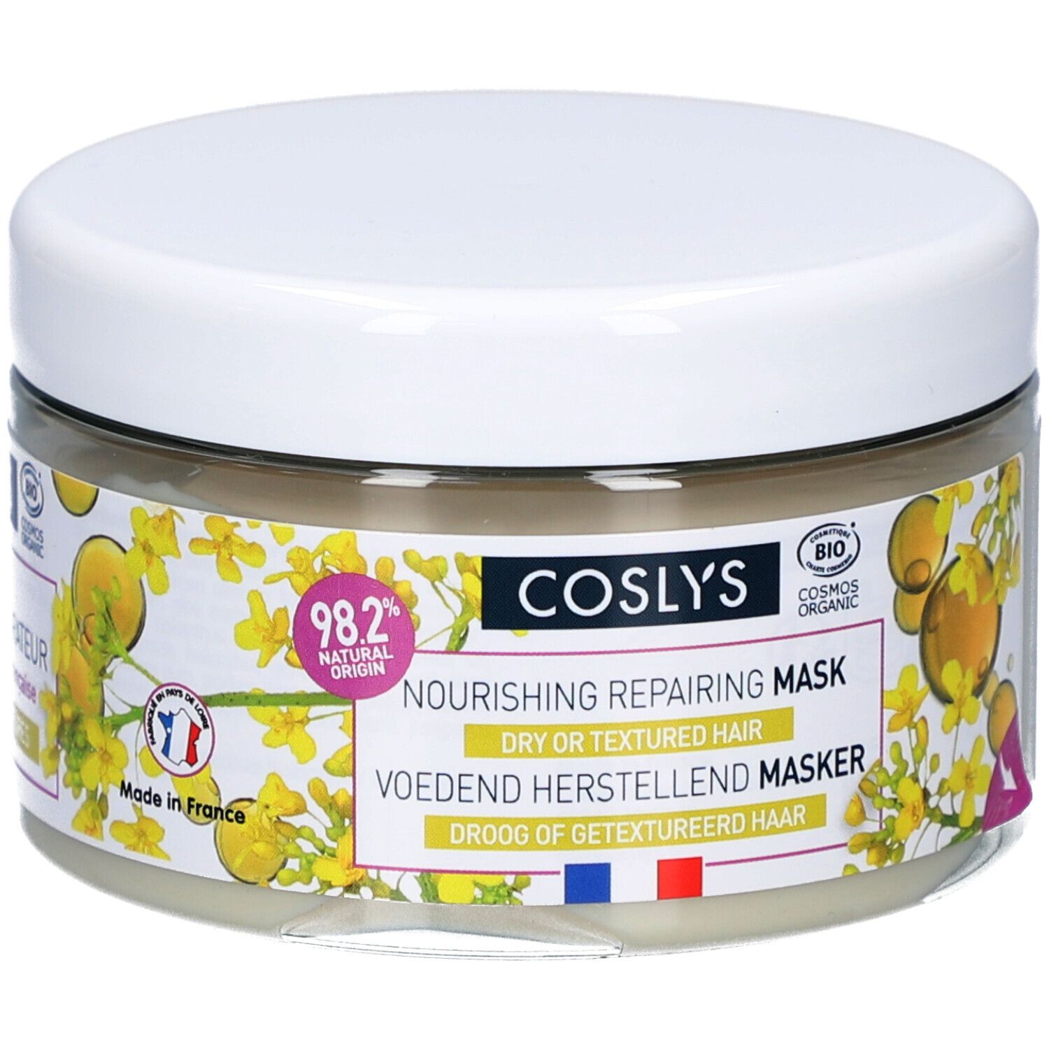 Pot en verre avec couvercle blanc. Inscription : Nourishing Repairing Mask. Contient 98,2% d'origine naturelle. Avec label bio français.