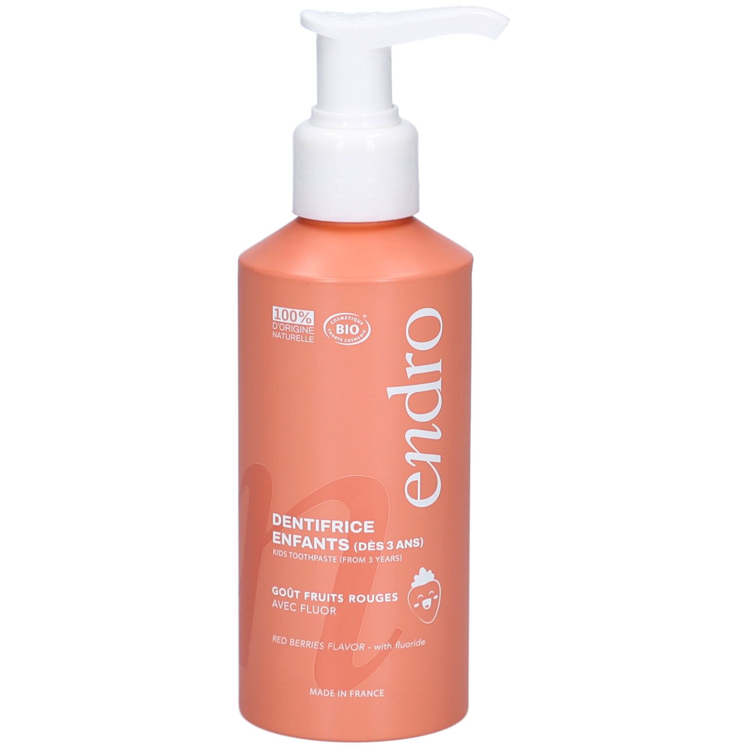 Flacon de dentifrice rouge avec pompe blanche. Inscriptions: endro, Dentifrice Enfants, Gout Fruits Rouges, avec Fluor. Certification Bio.