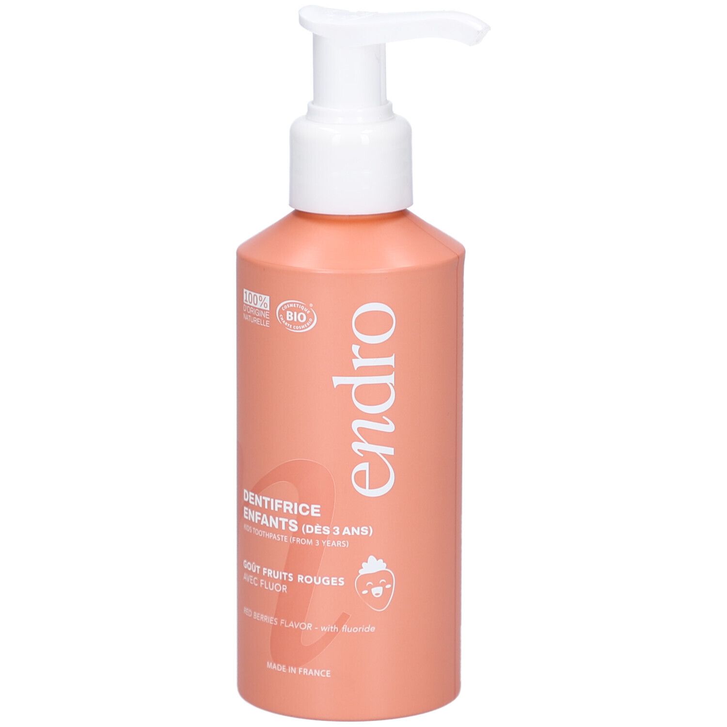 Flacon de dentifrice rouge avec pompe blanche. Inscriptions: endro, Dentifrice Enfants, Gout Fruits Rouges, avec Fluor. Certification Bio.