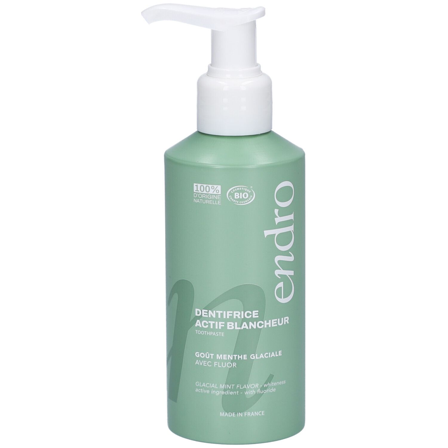 Flacon vert avec pompe blanche. Inscription: Endro, Dentifrice Actif Blancheur, Goût Menthe Glaciale. Certification Bio.