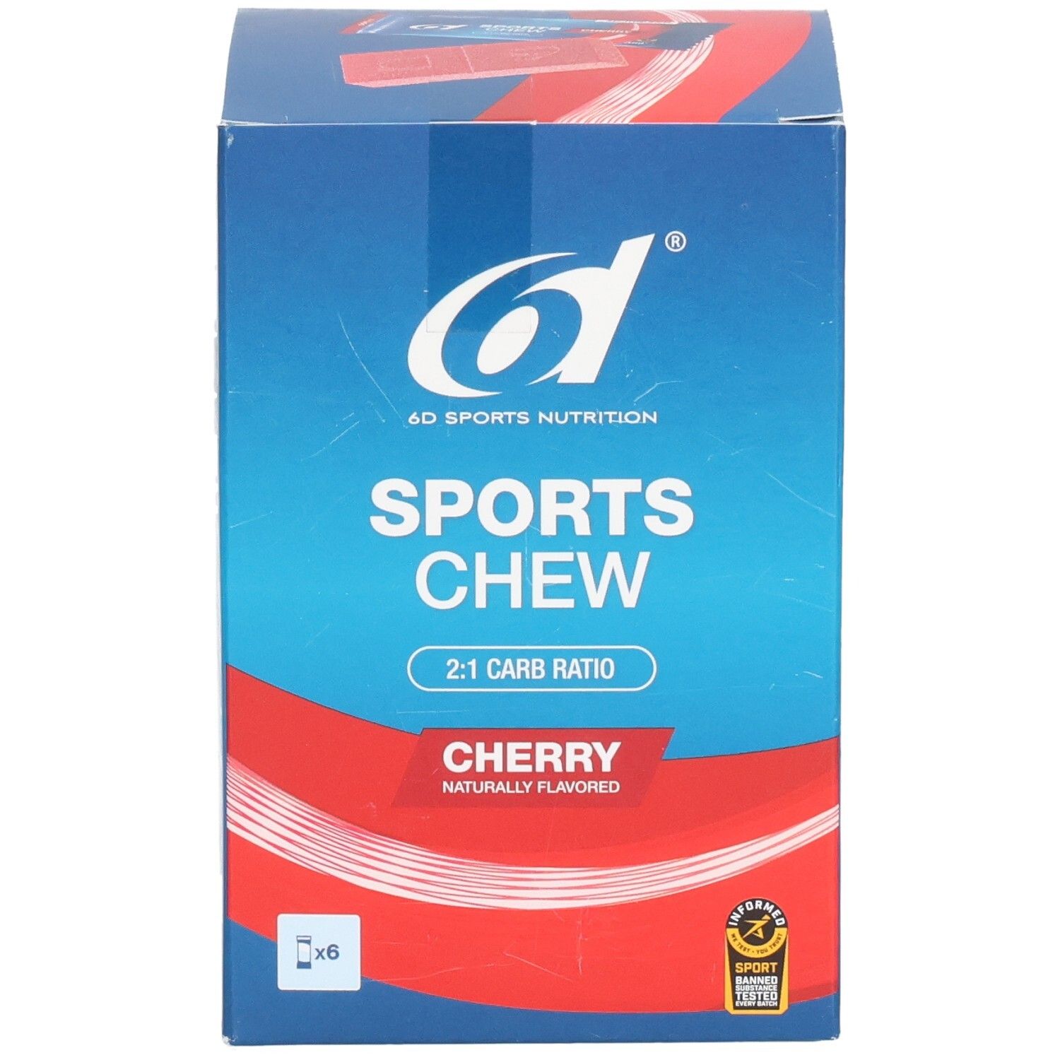 Boîte en carton bleu et rouge. Inscription: 6D SPORTS NUTRITION, SPORTS CHEW, 2:1 CARB RATIO, CHERRY. Avec 6 x. Sceau.