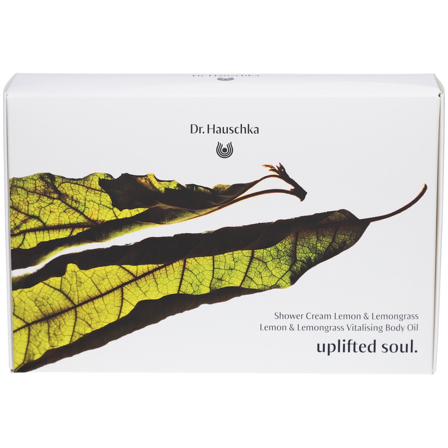 Boîte blanche avec motif de feuille et texte. Contient: Shower Cream Lemon & Lemongrass, Uplifted Soul.