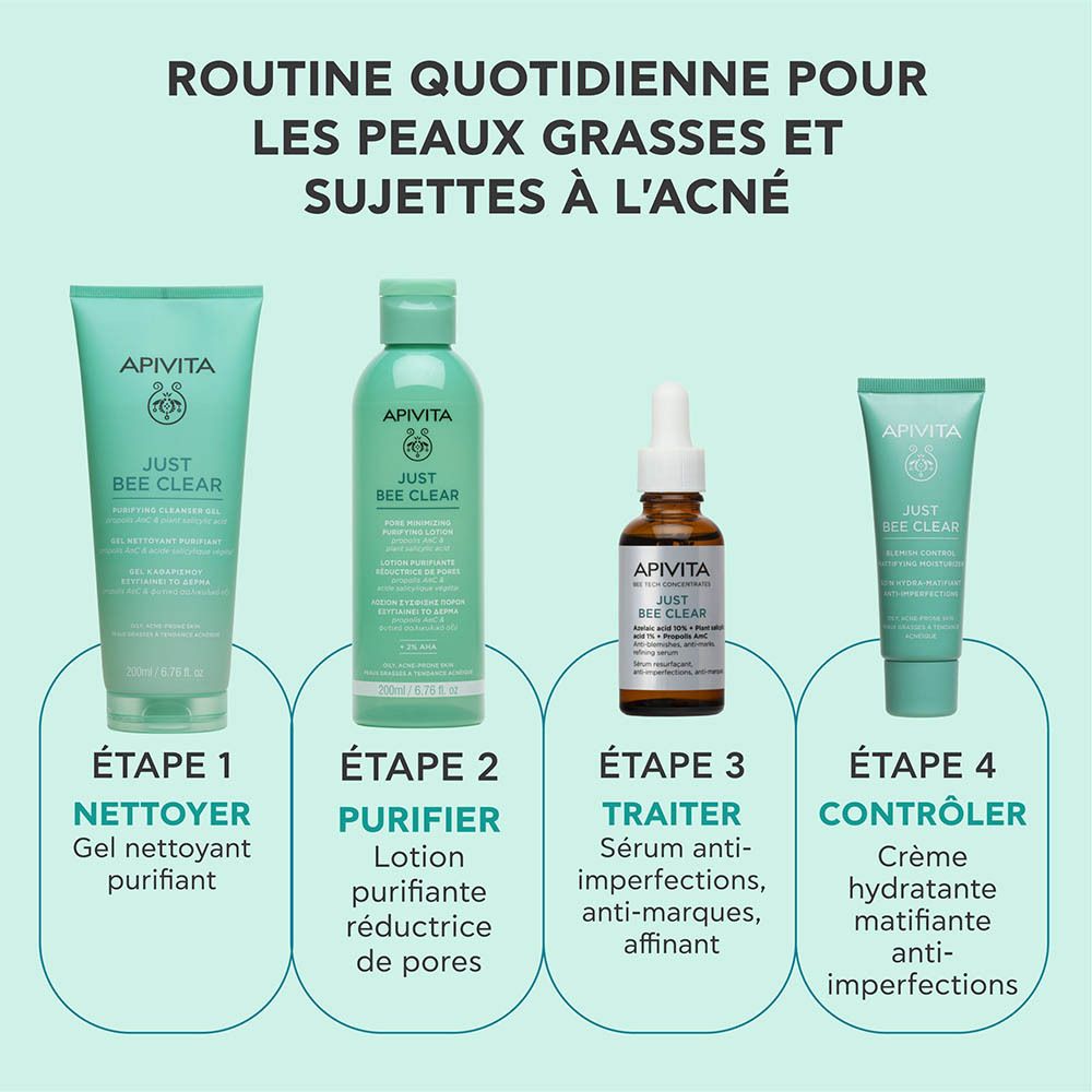 Flacon sur verre. Inscription : Apivita Just Bee Clear Sérum Anti-Imperfections. Texte : 93% naturel.