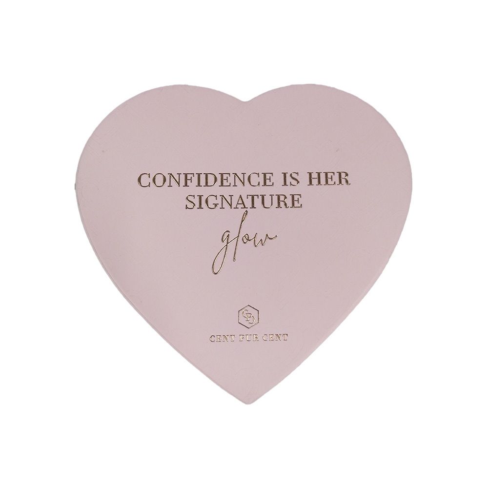 Boîte rose en forme de cœur. Inscription : "CONFIDENCE IS HER SIGNATURE glow". Marque : Cent Pur Cent.