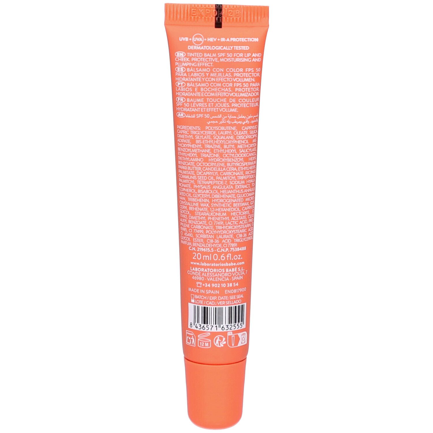 Dos du tube de baume lèvres et joues. Contient texte multilingue, ingrédients et code-barres. Couleur orange.