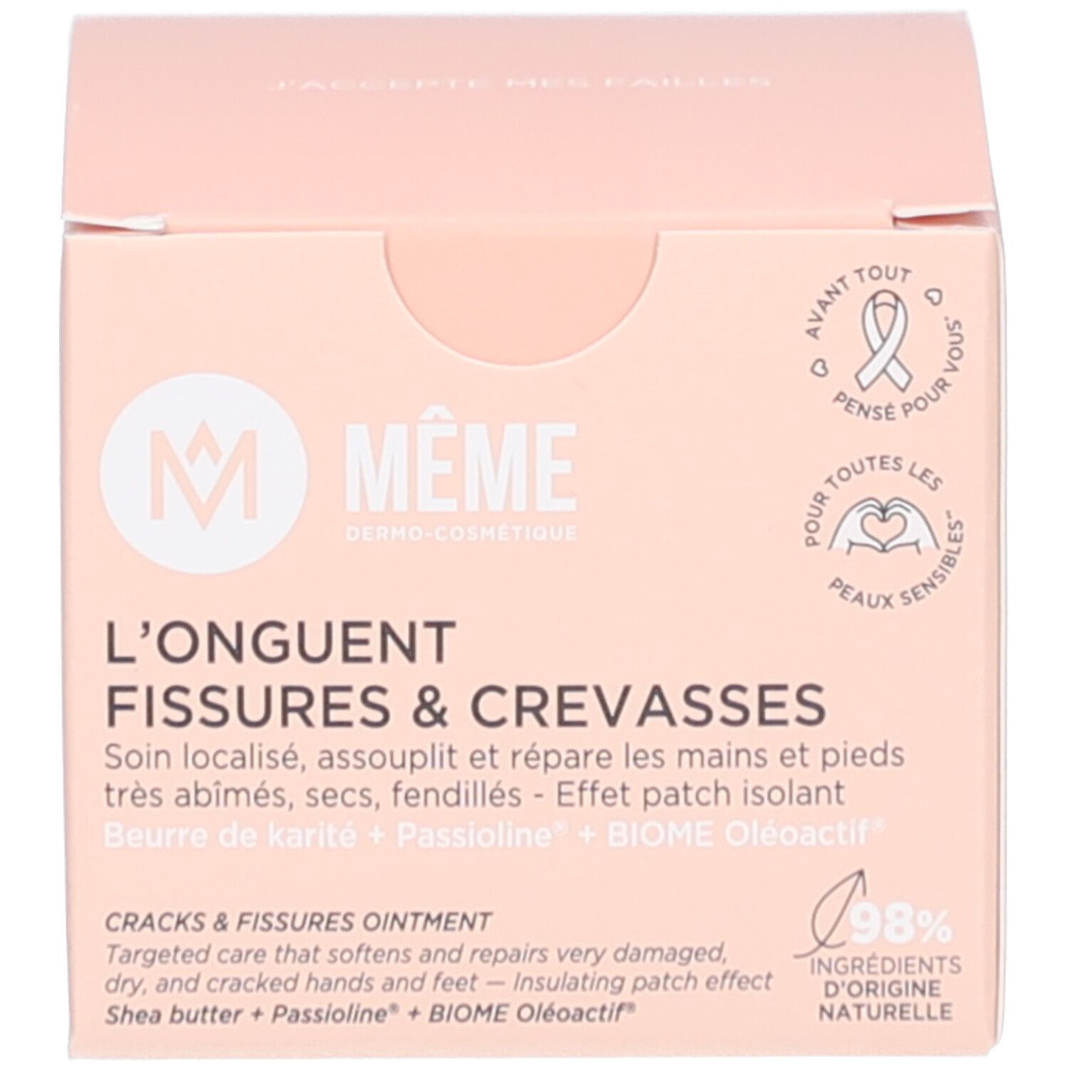 Boîte avec inscription: L'ONGUENT FISSURES & CREVASSES. Marque: MÊME. Emballage rose avec informations. 98% ingrédients naturels.