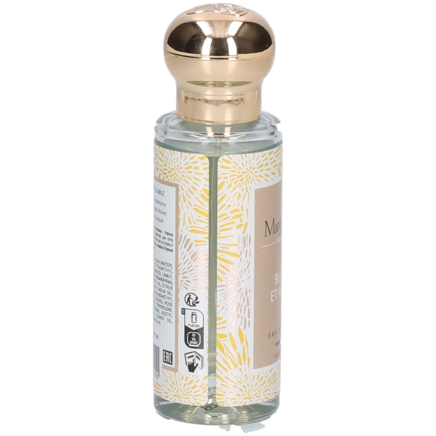 Arrière d'une bouteille de parfum Margot & Tita avec ingrédients et motif floral.