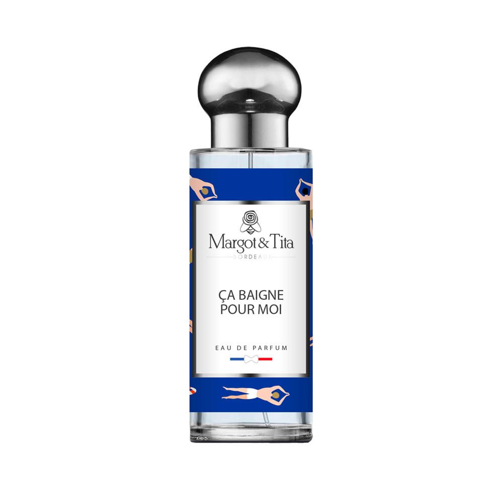 Flacon de parfum Margot & Tita, bouchon argenté, étiquette bleue avec motif de nageurs.