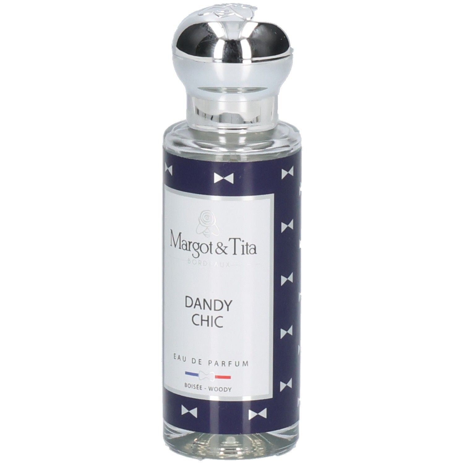 Flacon Margot & Tita Dandy Chic Eau de Parfum avec bouchon argenté et étiquette bleu marine à nœuds.