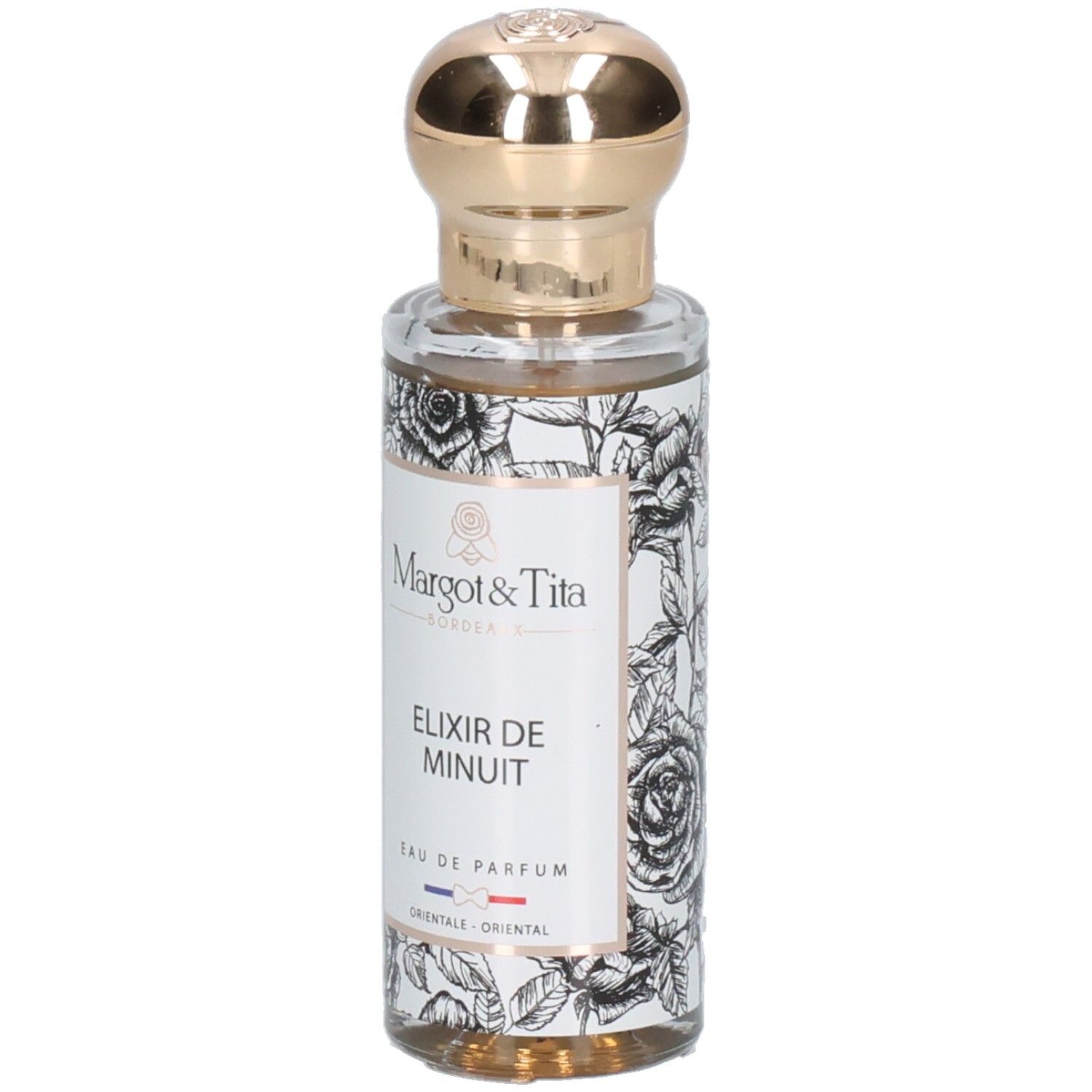 Flacon Margot & Tita Elixir de Minuit Eau de Parfum avec bouchon doré et design floral.