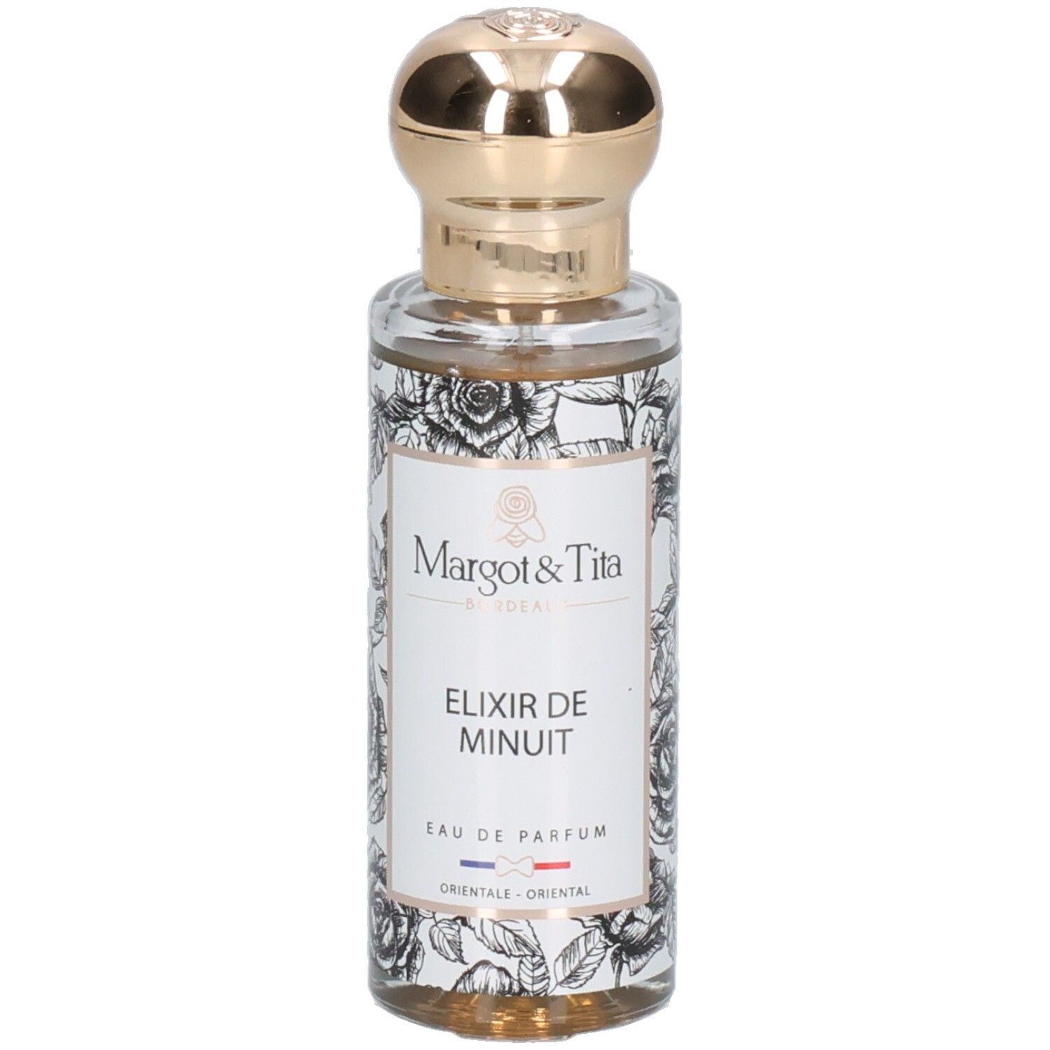 Flacon Margot & Tita Elixir de Minuit Eau de Parfum avec motif floral et bouchon doré.
